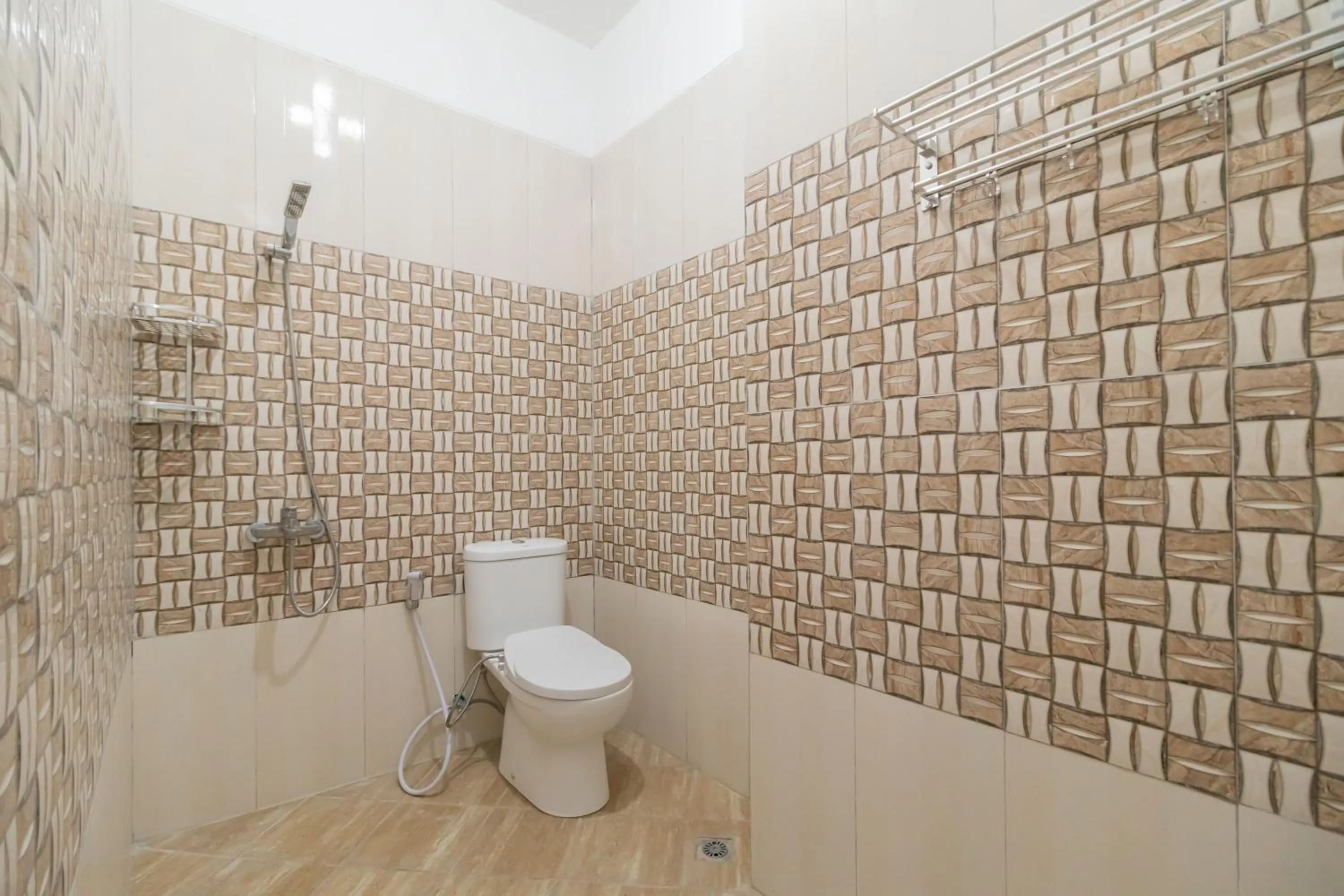 Bathroom in Urbanview Hotel Ephe Palembang by RedDoorz