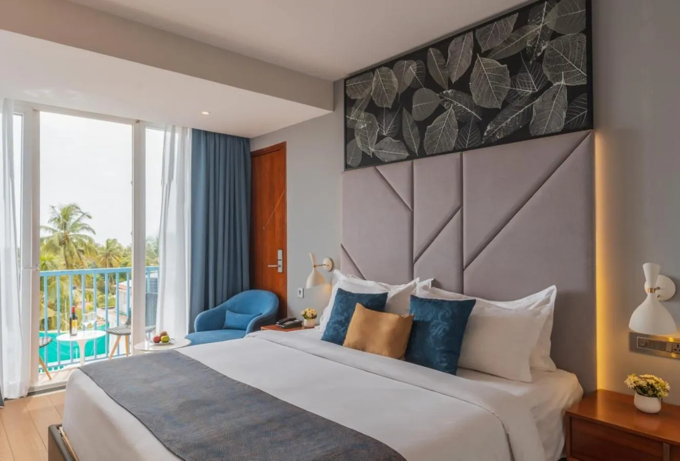 Bed in De Mandarin Hotel Goa