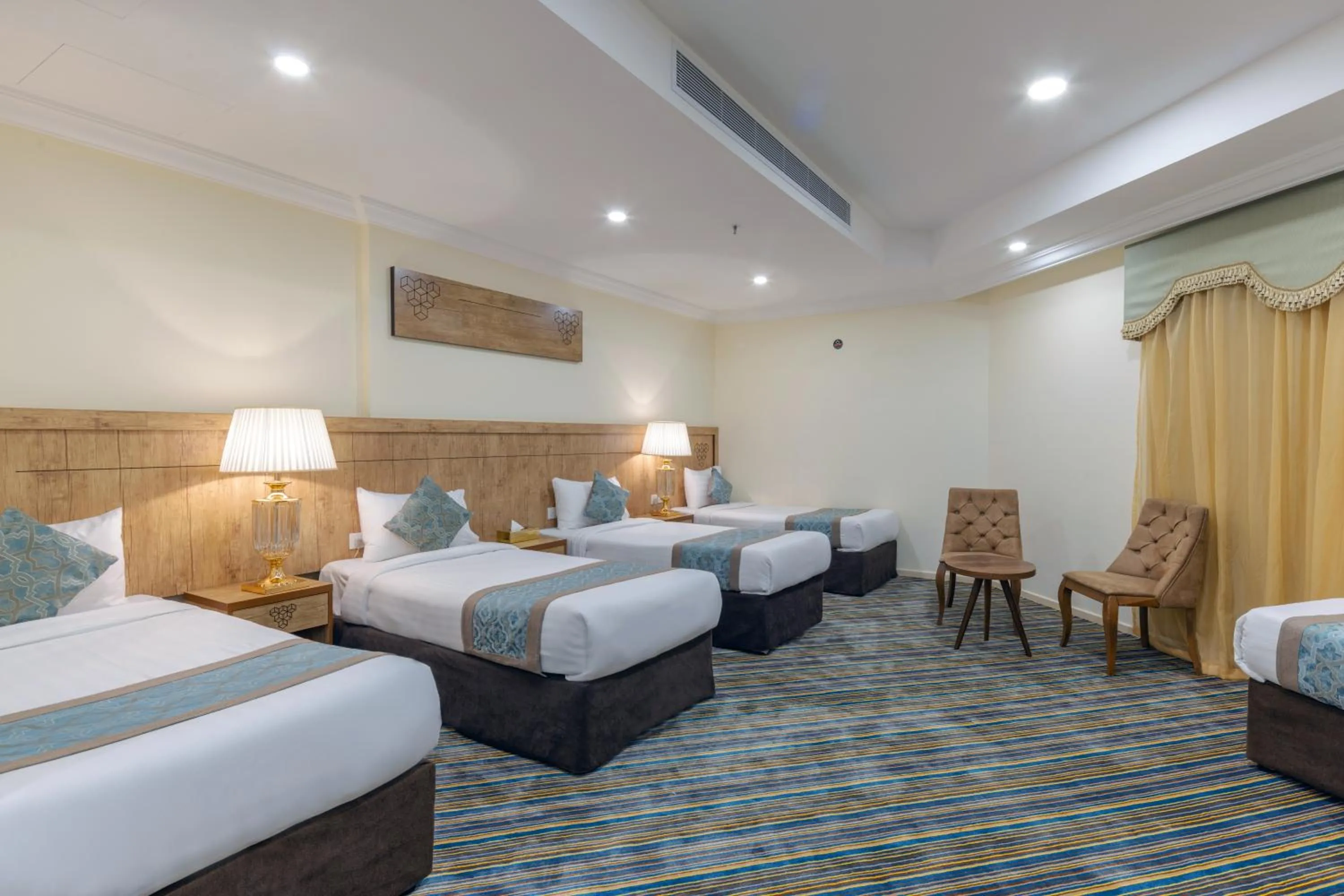 Bed in Snood Al Dana Hotel