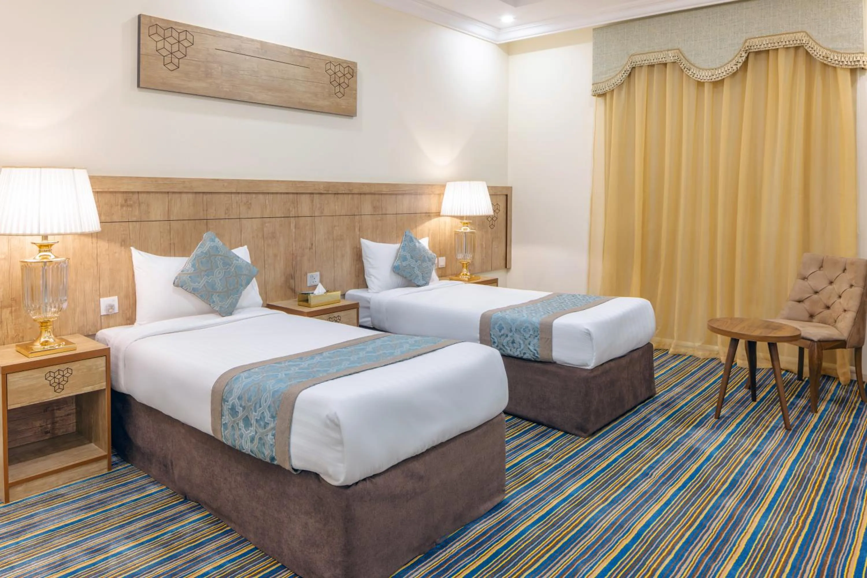 Bed in Snood Al Dana Hotel