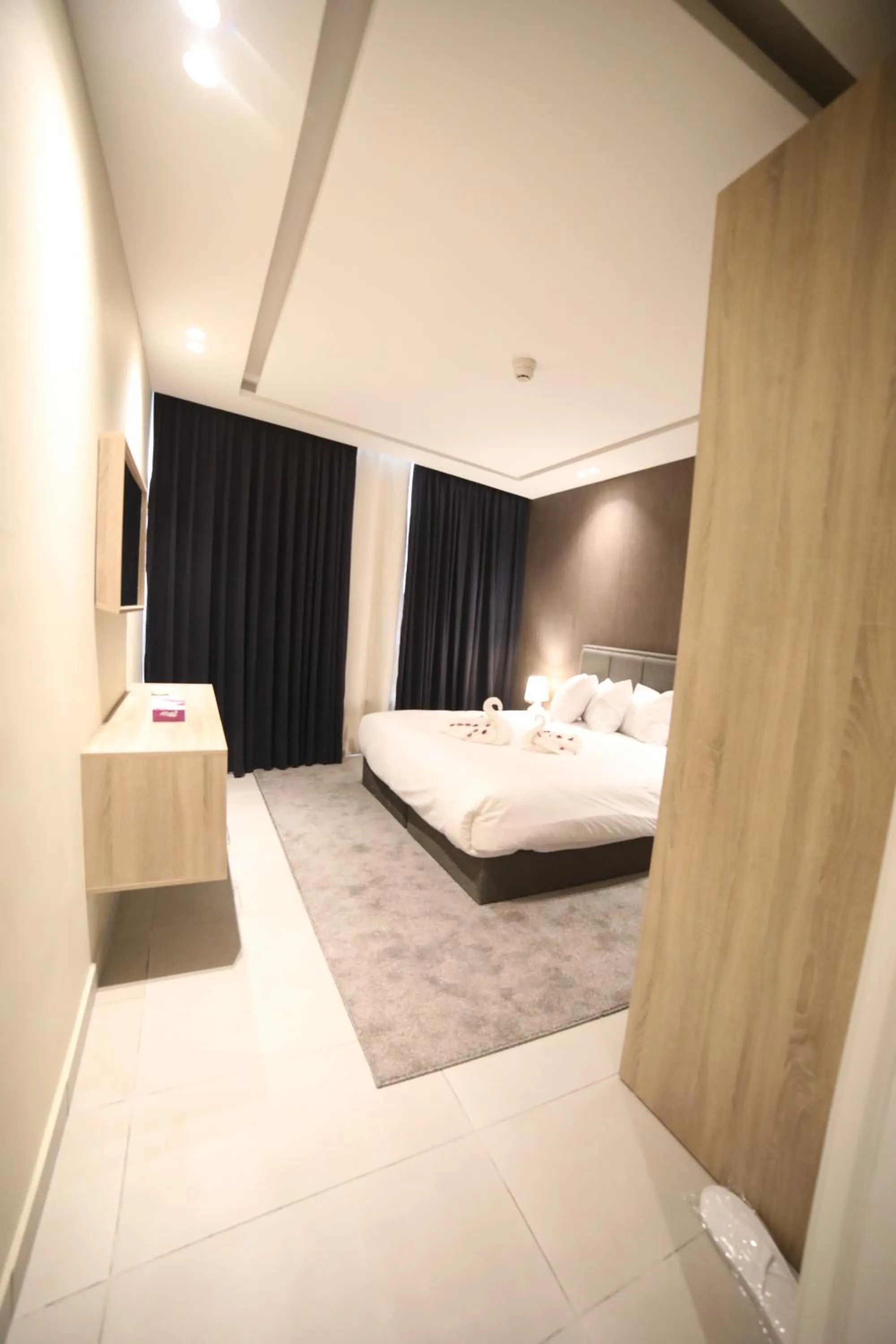 Bed in فندق صحارى الخليج Sahara Gulf Hotel Apartments