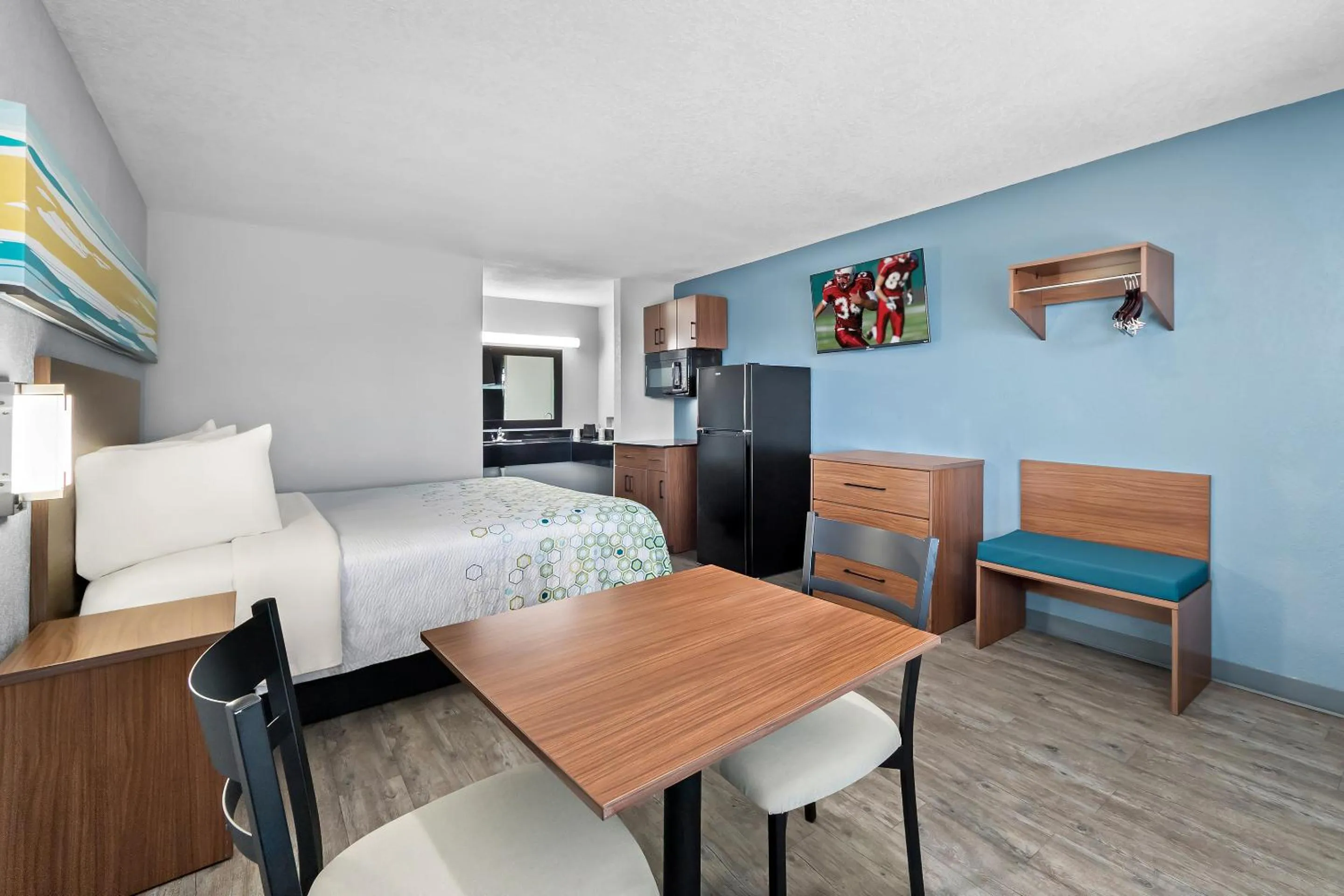 Photo of the whole room in HomeTowne Studios by Red Roof San Antonio E - Frost Bank Center