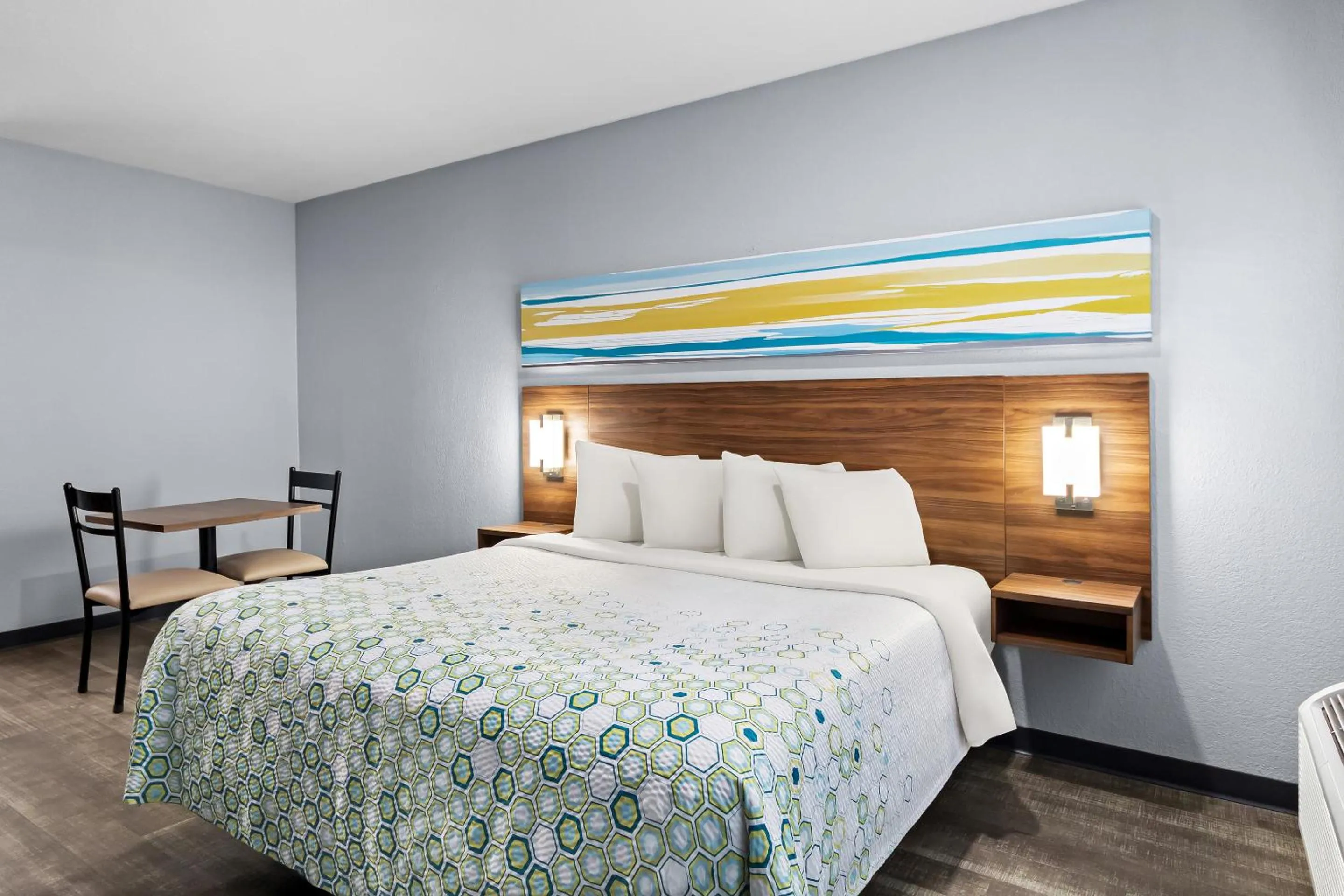 Photo of the whole room, Bed in HomeTowne Studios by Red Roof San Antonio E - Frost Bank Center