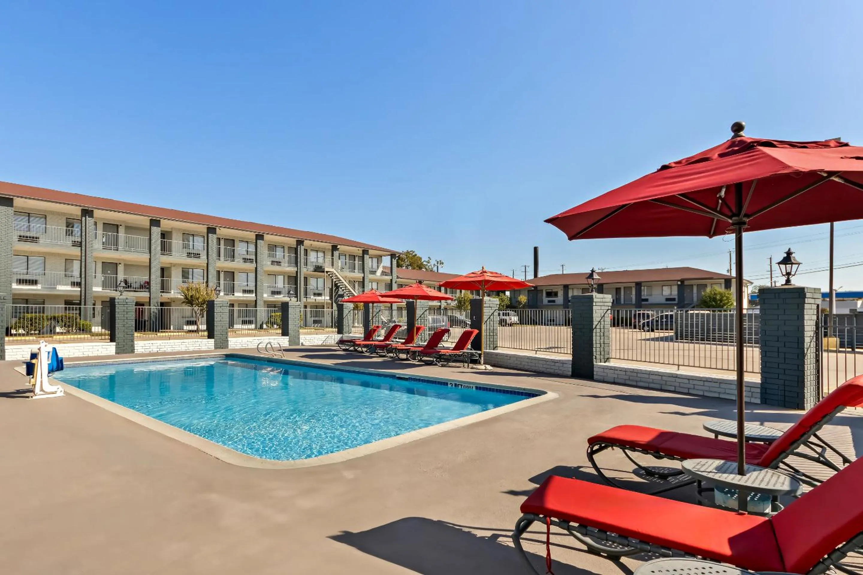 Swimming pool in HomeTowne Studios by Red Roof San Antonio E - Frost Bank Center