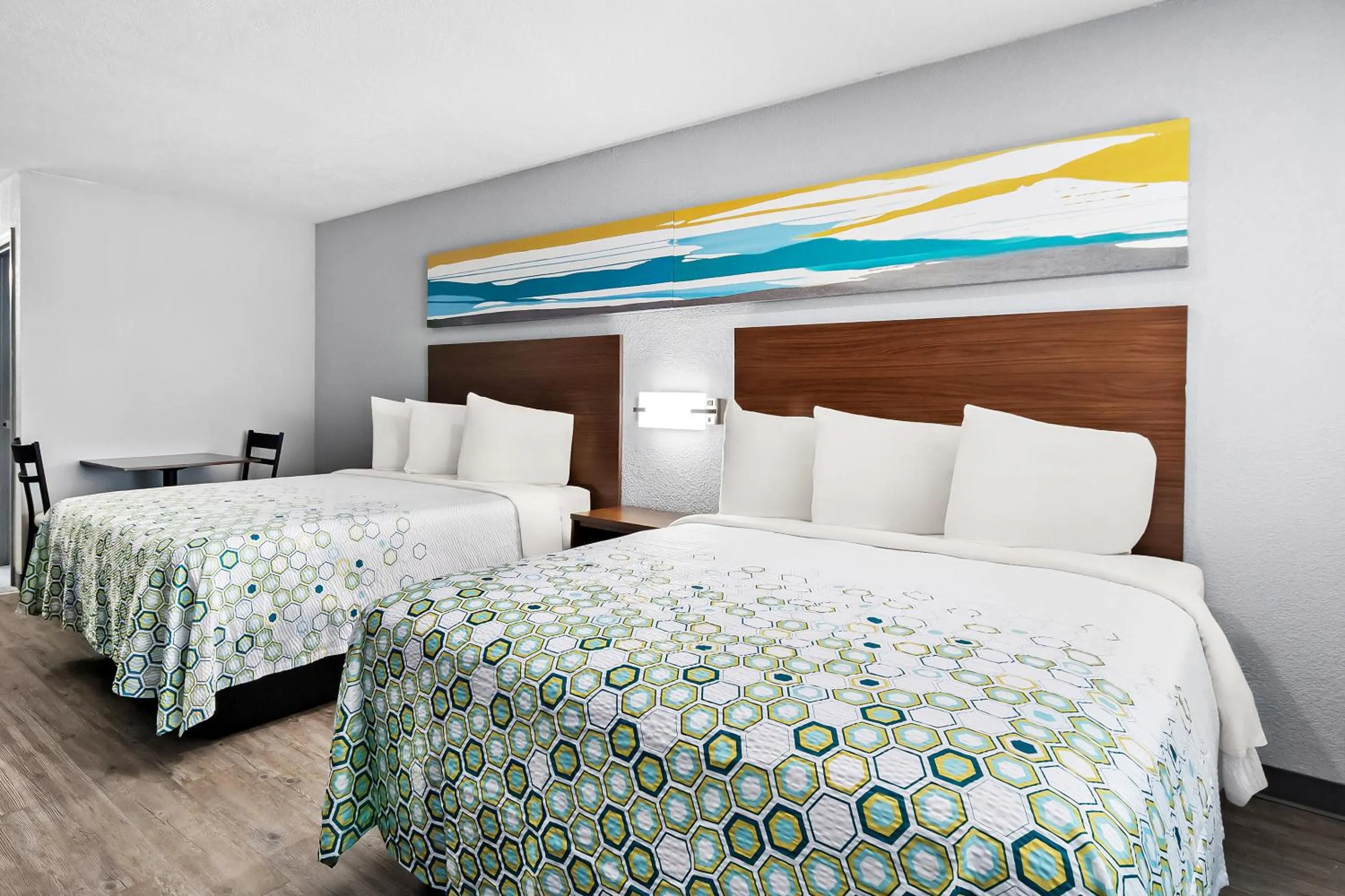 Photo of the whole room, Bed in HomeTowne Studios by Red Roof San Antonio E - Frost Bank Center