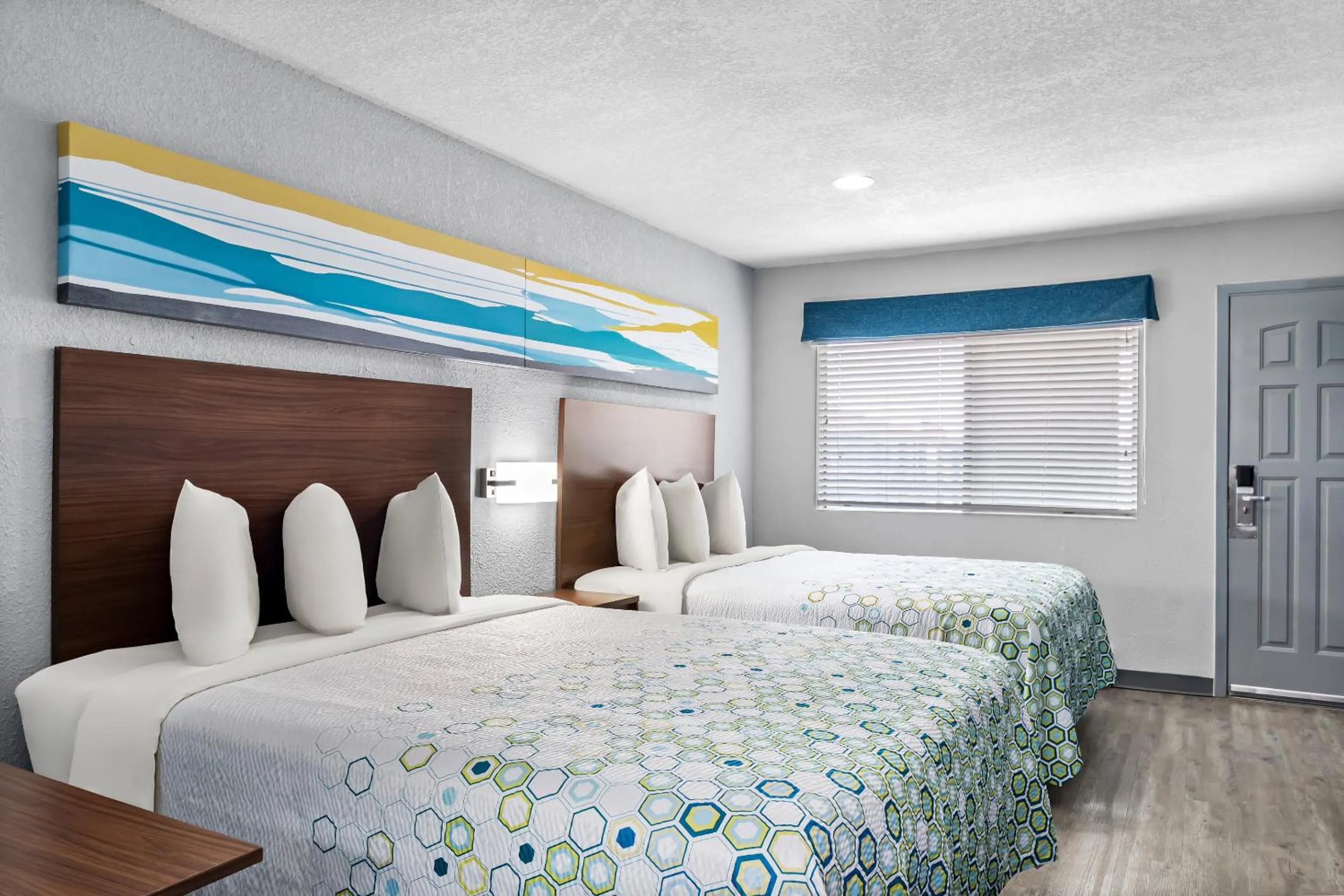 Photo of the whole room, Bed in HomeTowne Studios by Red Roof San Antonio E - Frost Bank Center