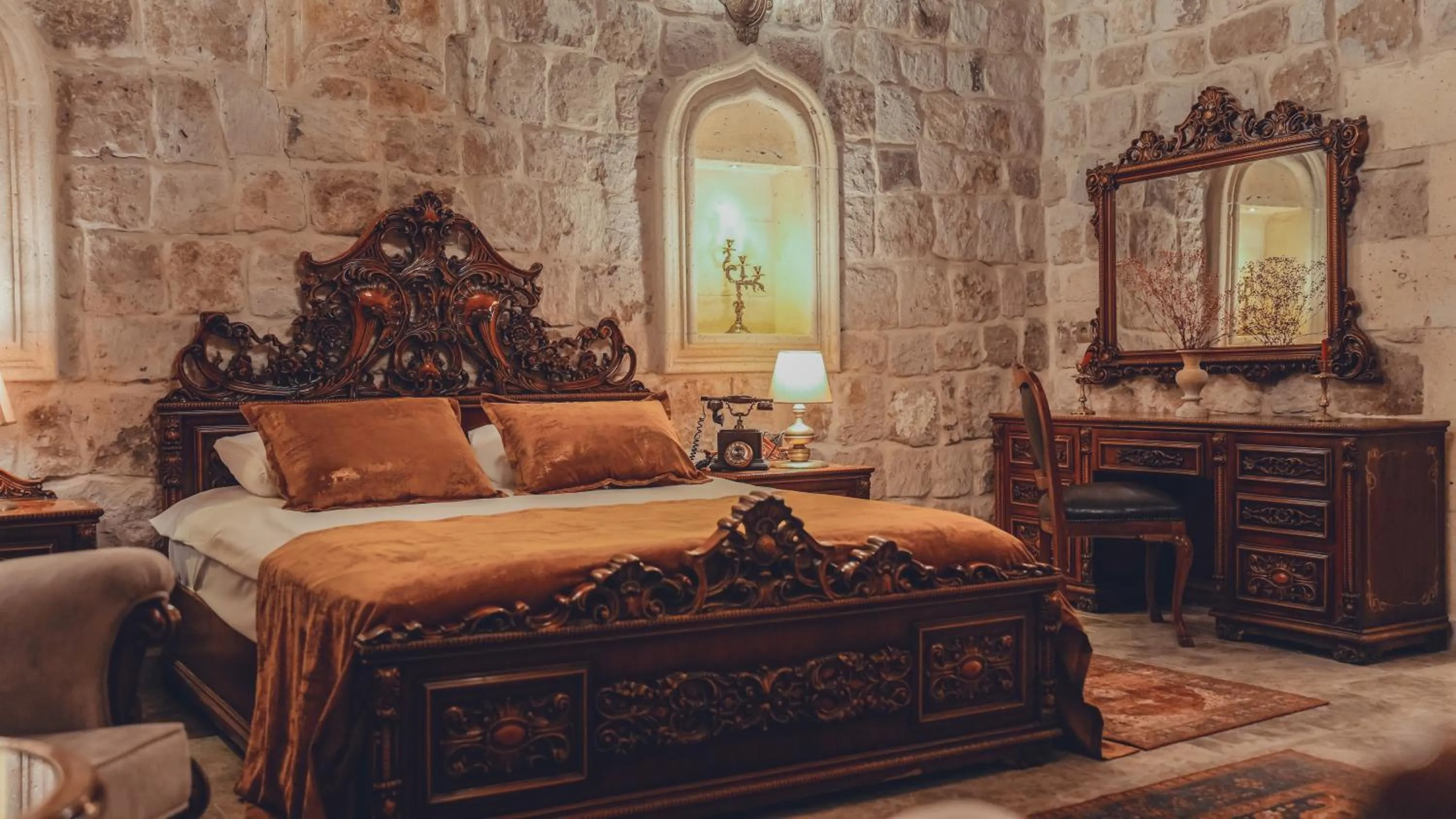 Bed in Serenus Cave Suites