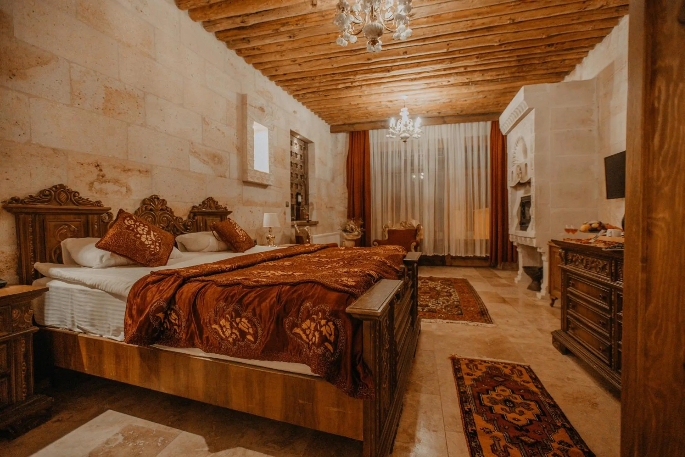 Bed in Serenus Cave Suites