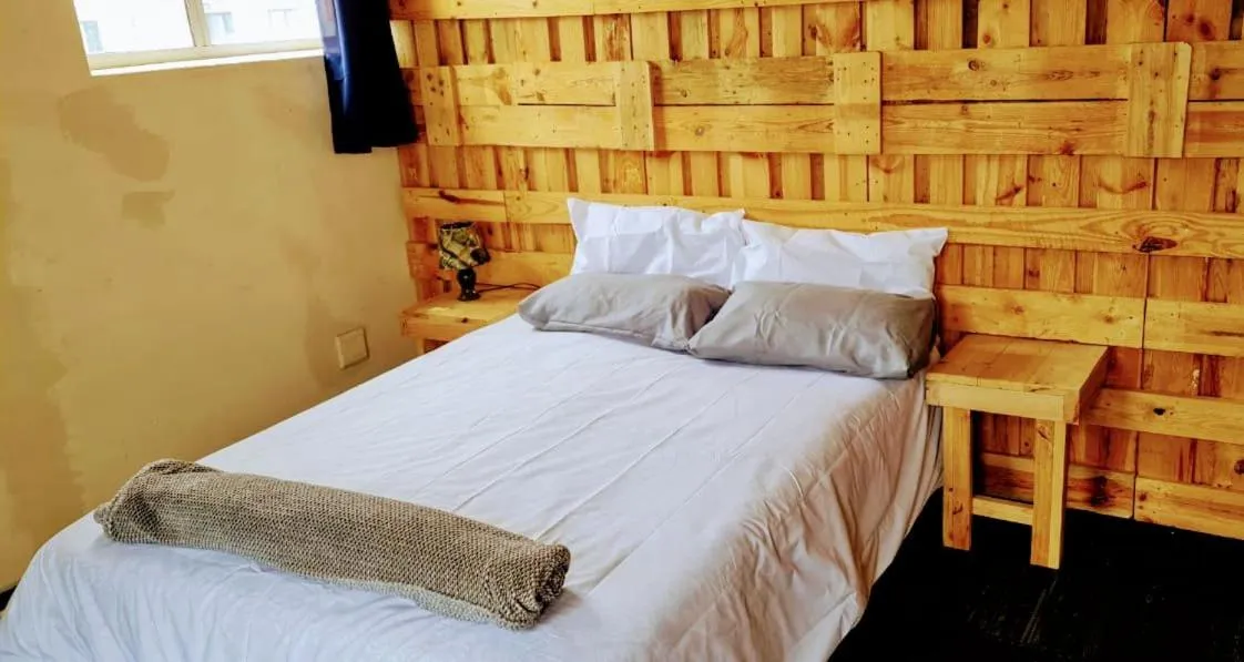 Bedroom in Sunset beach backpackers