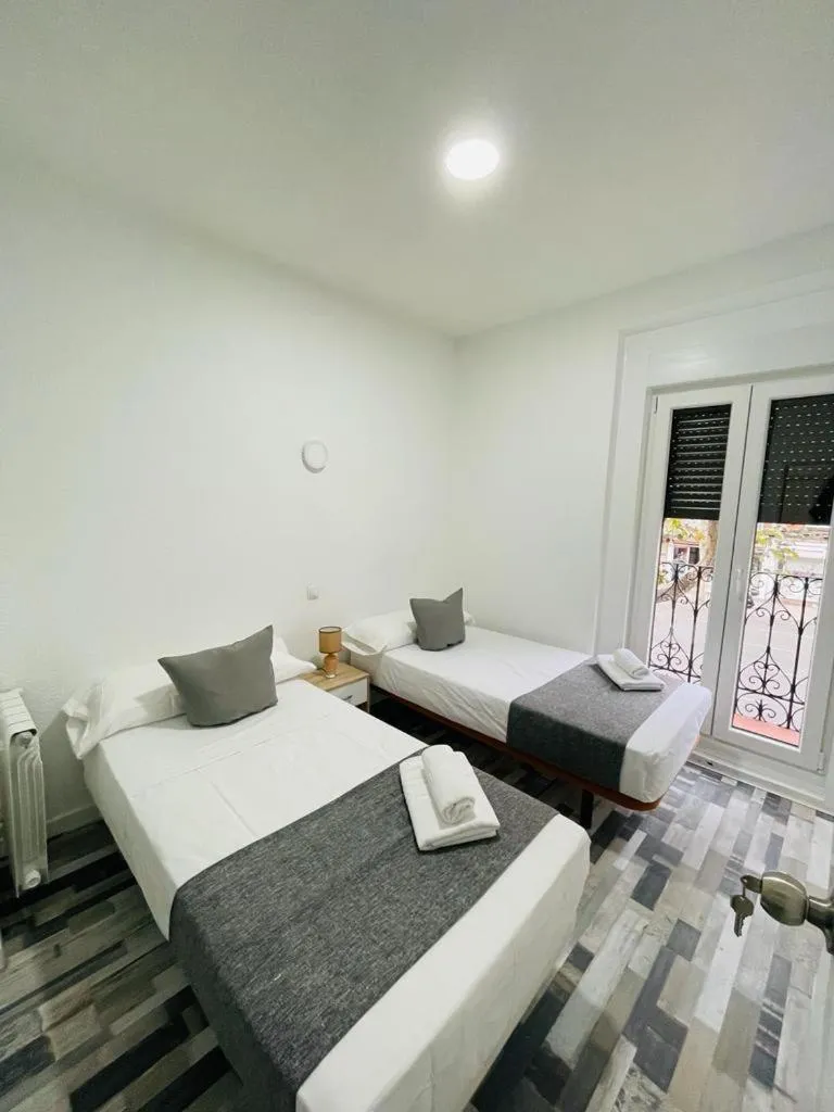 Bed in HOSTAL Noche y Dia