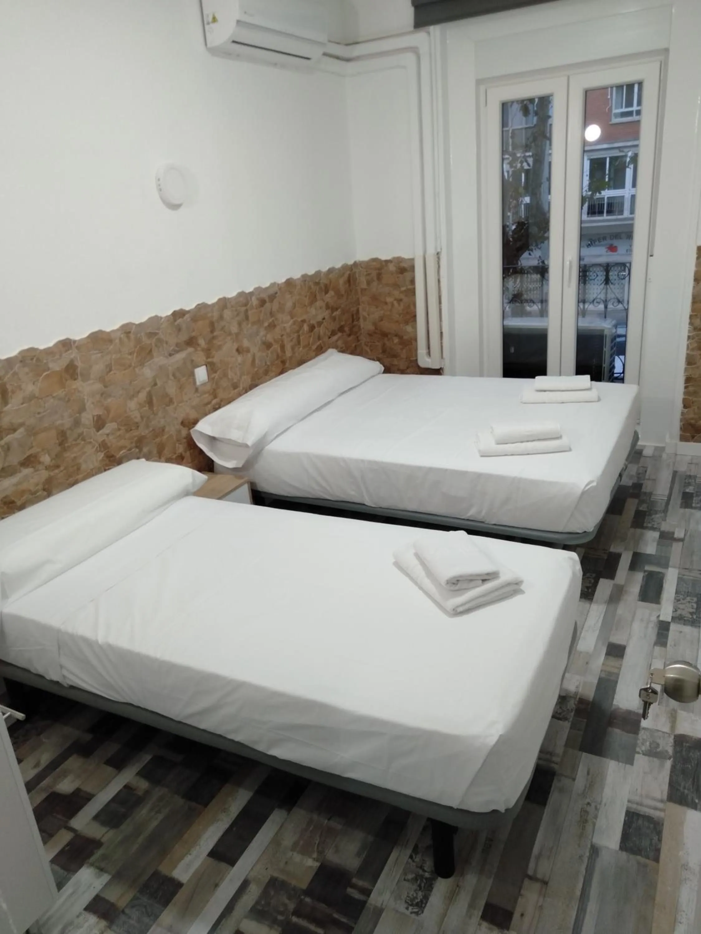 Bed in HOSTAL Noche y Dia