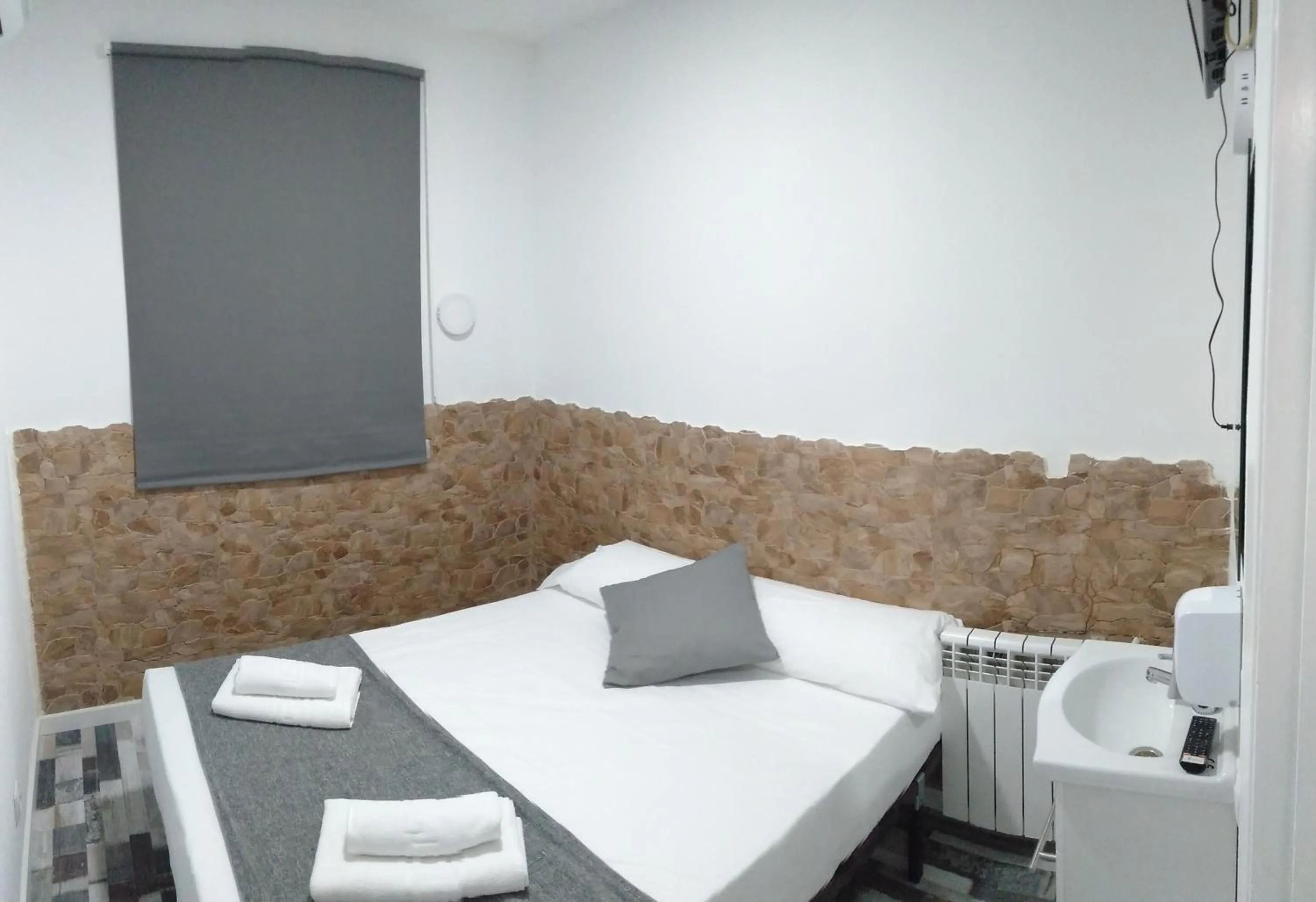 Bed in HOSTAL Noche y Dia