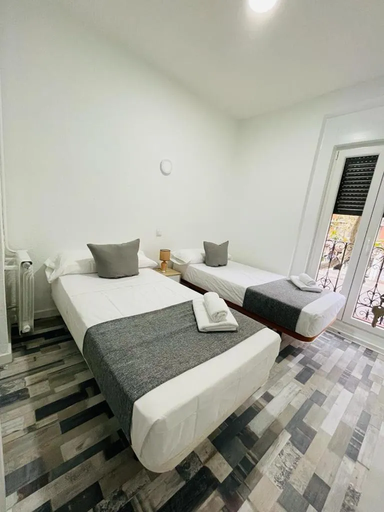 Bed in HOSTAL Noche y Dia