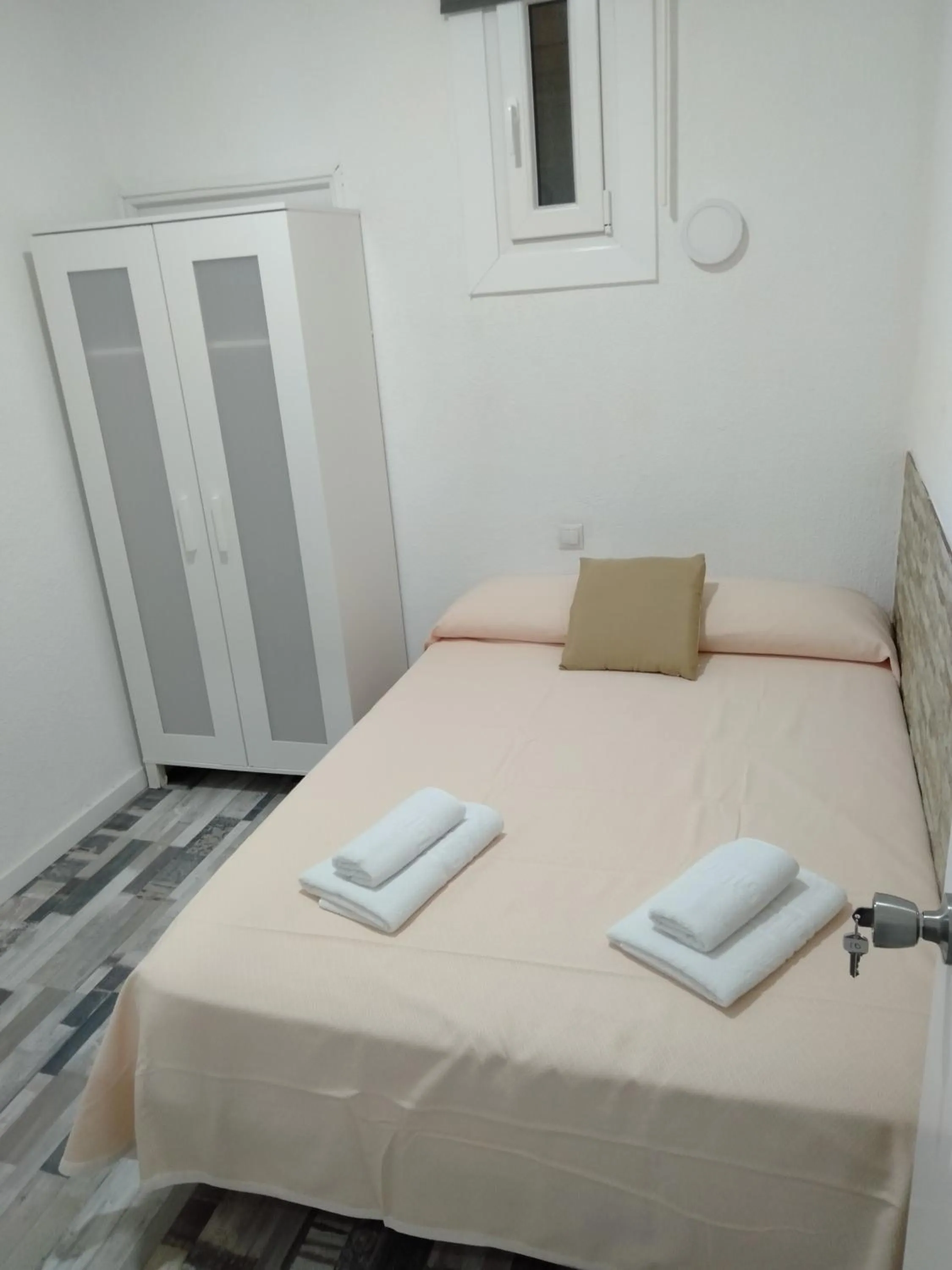 Bed in HOSTAL Noche y Dia