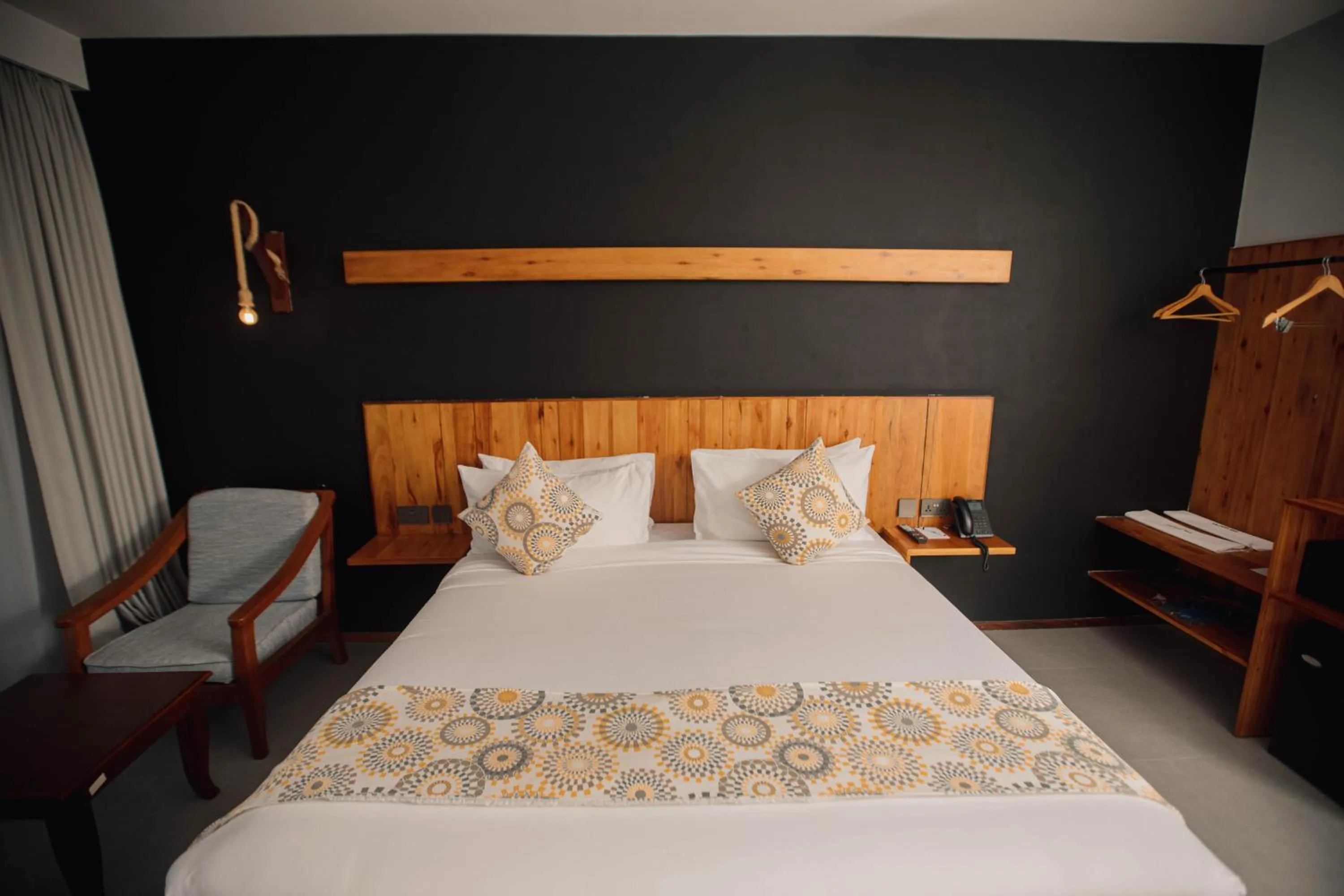 Bed in Giraffe Beach Hotel