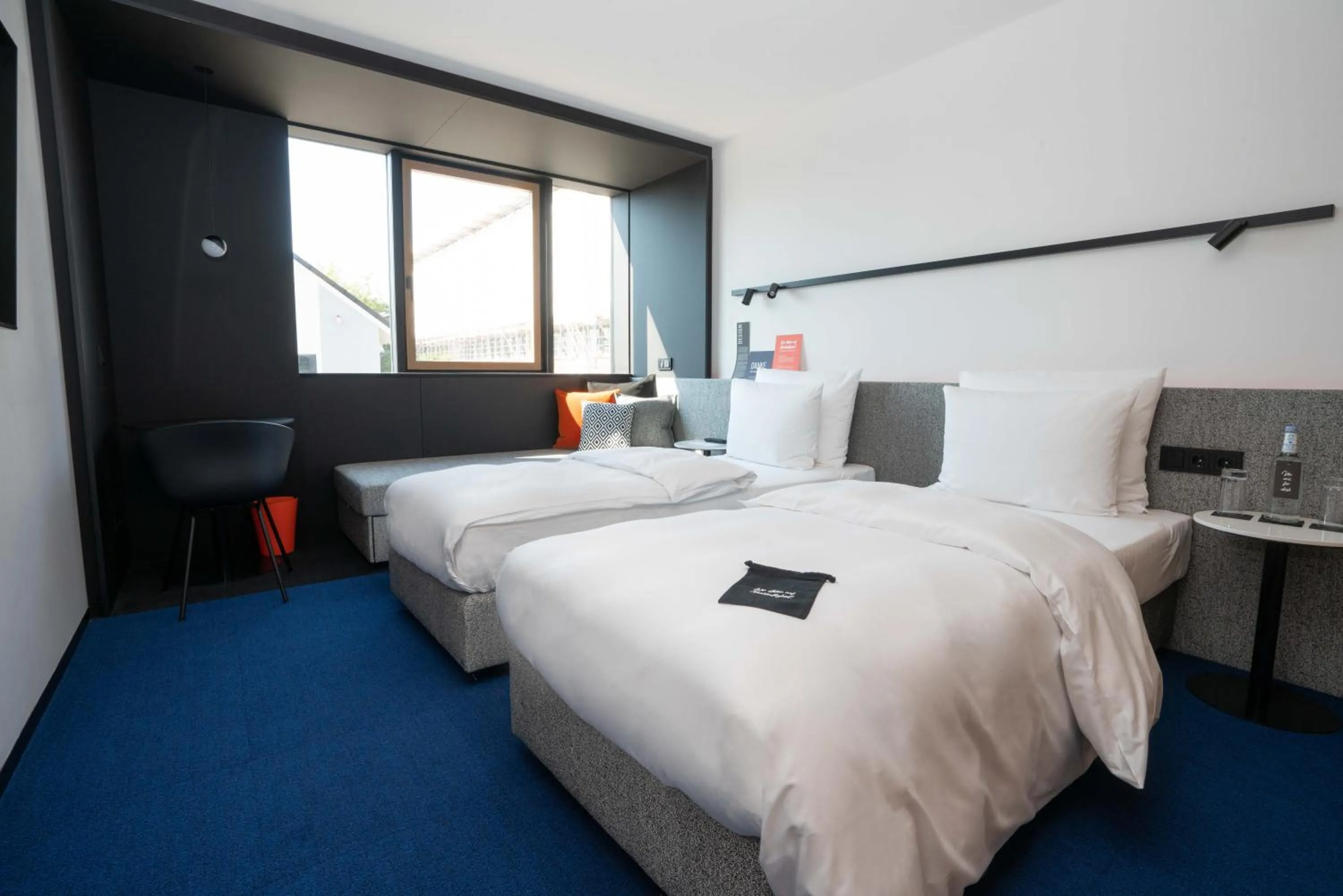 Photo of the whole room, Bed in GREFIS Hotel München-Gräfelfing