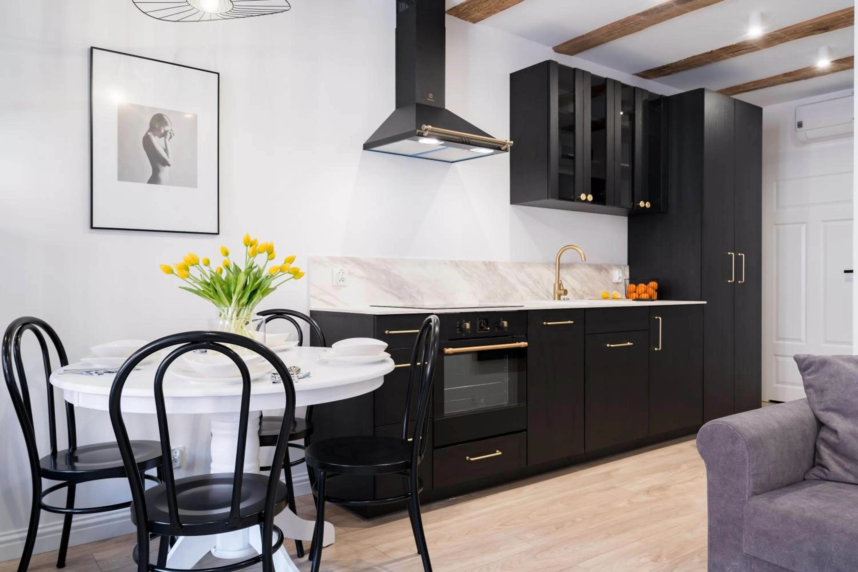 Kitchen or kitchenette in Miodowa Faktoria #7 by Rentoom