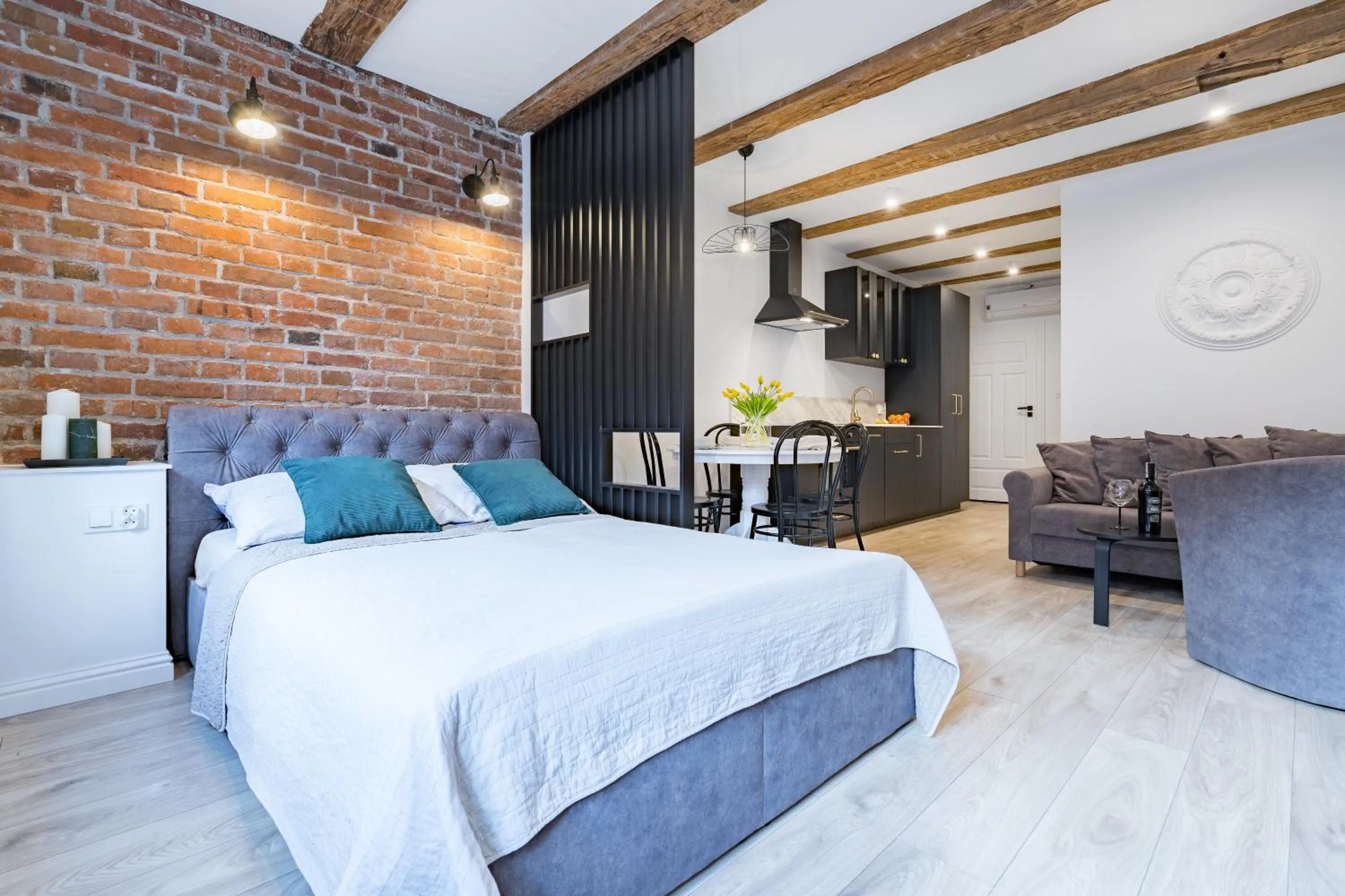 Bedroom, Bed in Miodowa Faktoria #7 by Rentoom