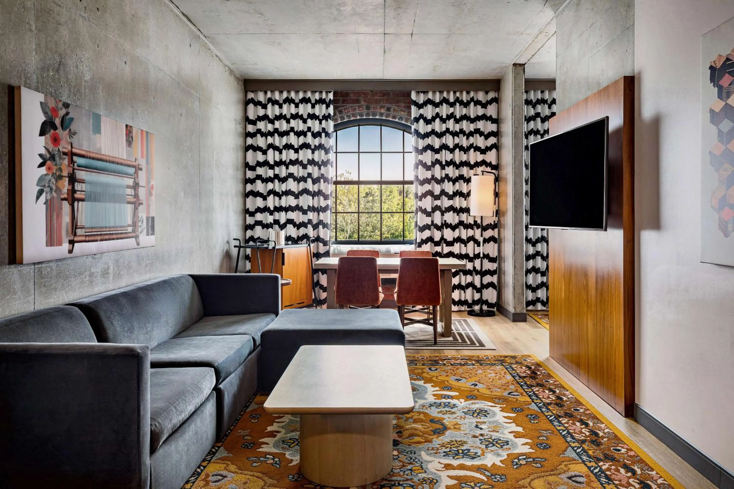 Living room in The LOOM Hotel, Tapestry Collection by Hilton