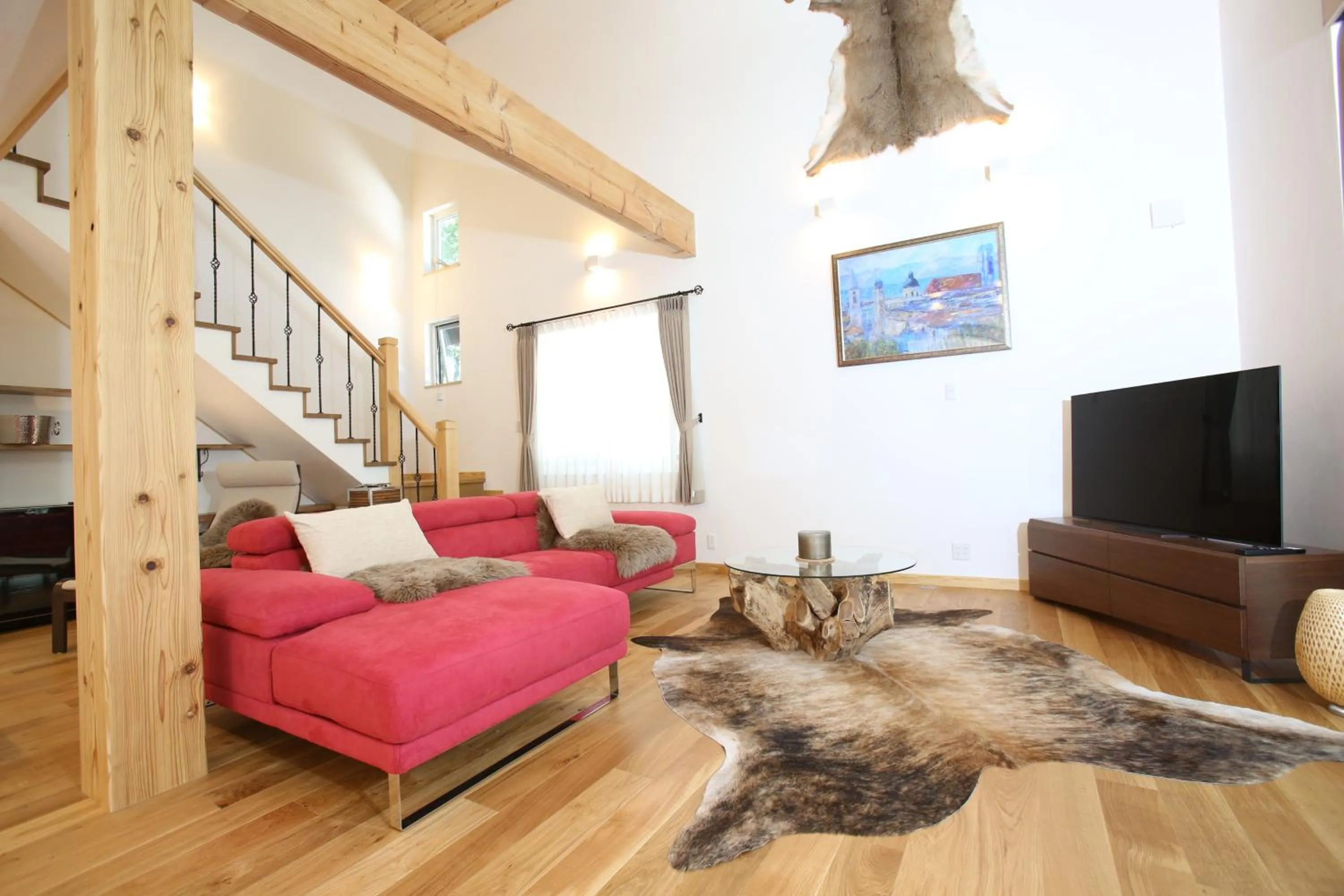 Living room in Villa Bavaria by Hakuba White Fox Company