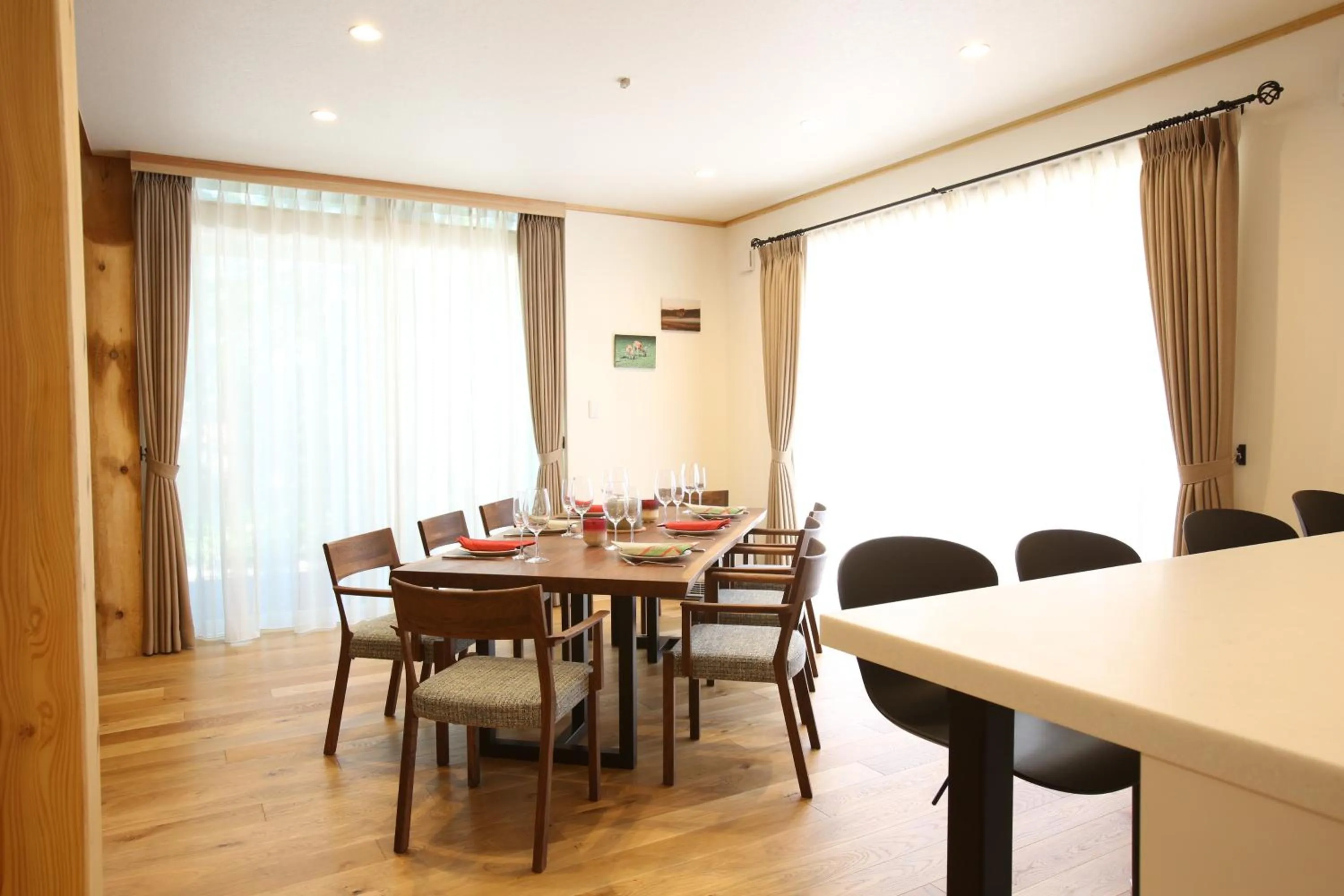 Dining area in Villa Bavaria by Hakuba White Fox Company