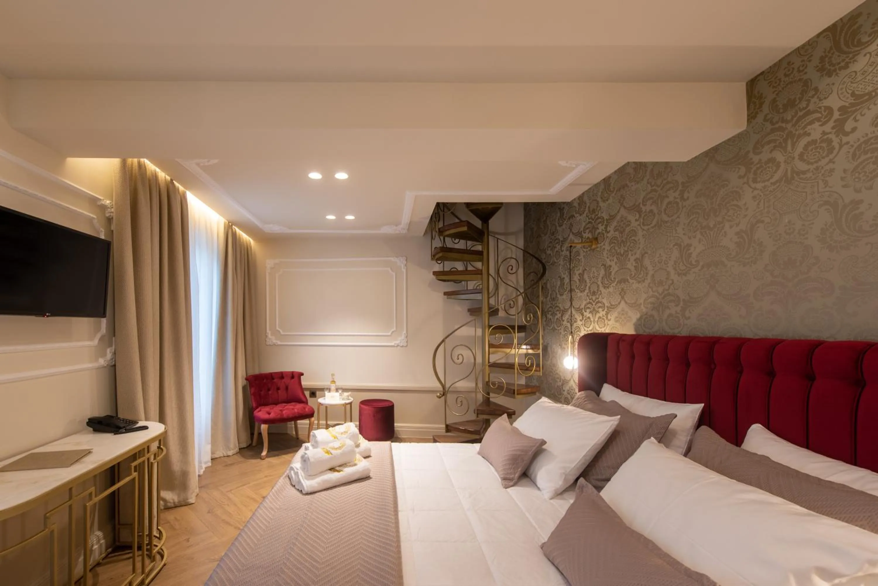 Bed in Capolavoro Suites