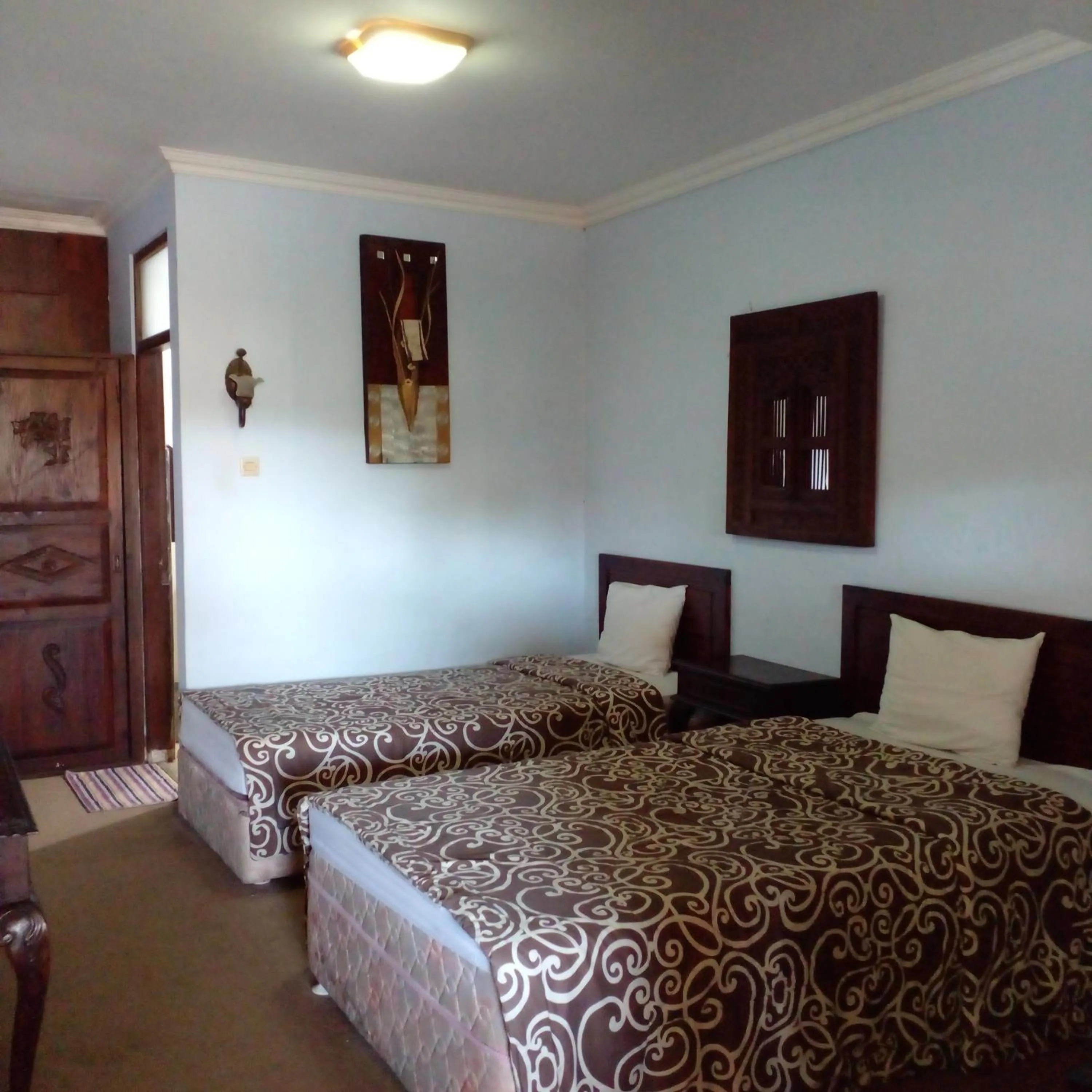 Bed in Hotel Bifa Yogyakarta