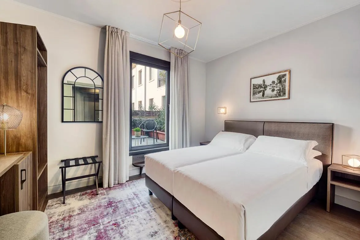 Photo of the whole room, Bed in Porta Altinia Suites