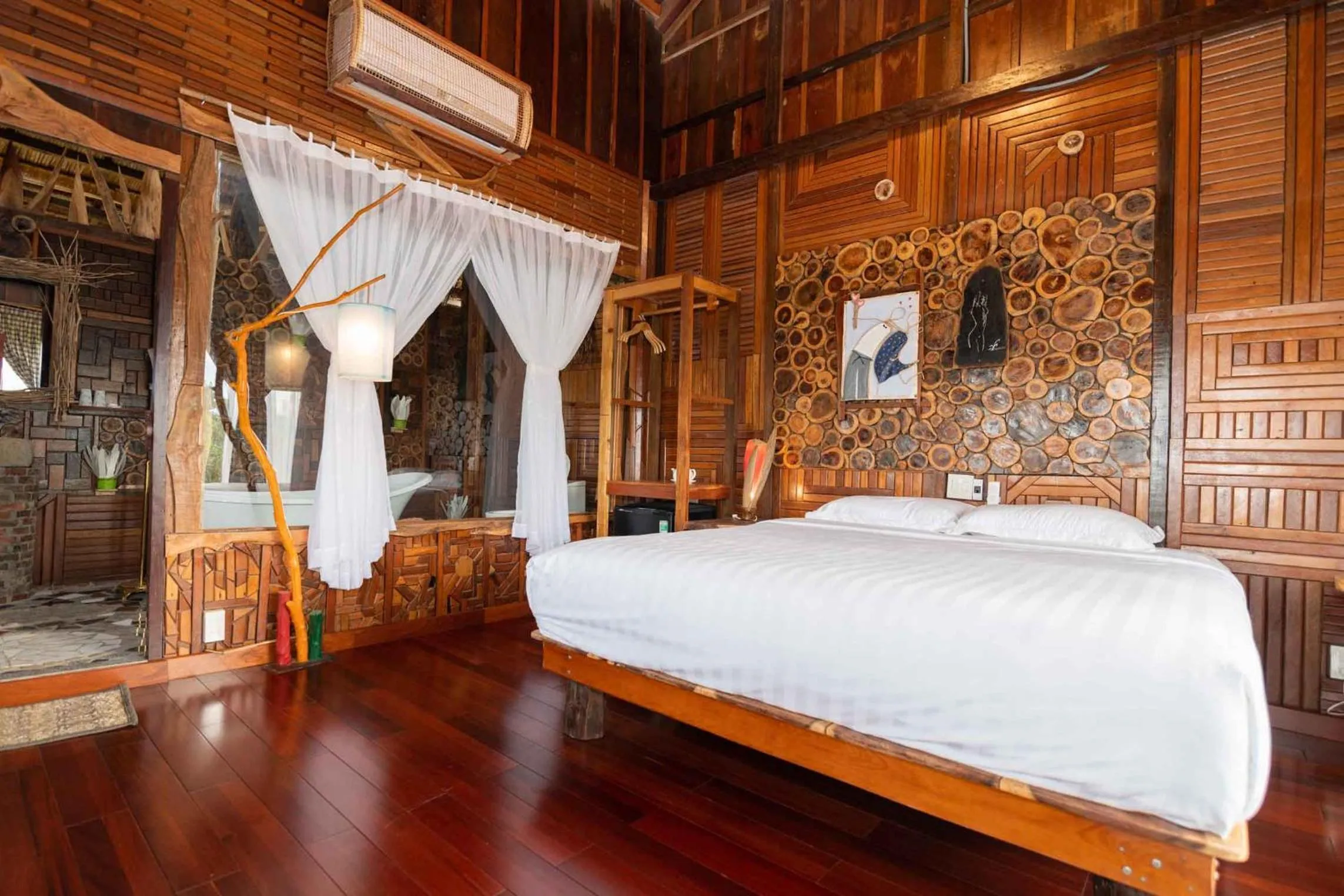 Bed in MEKONG SILT ECOLODGE