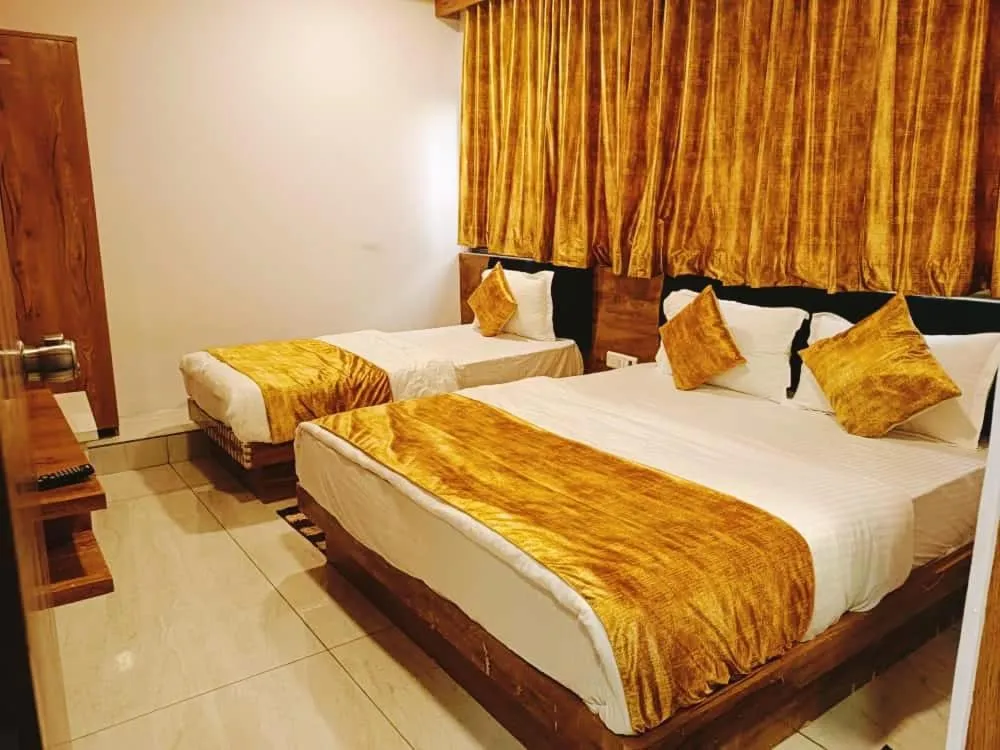 Bed in Hotel Mansarovar,Vadodara