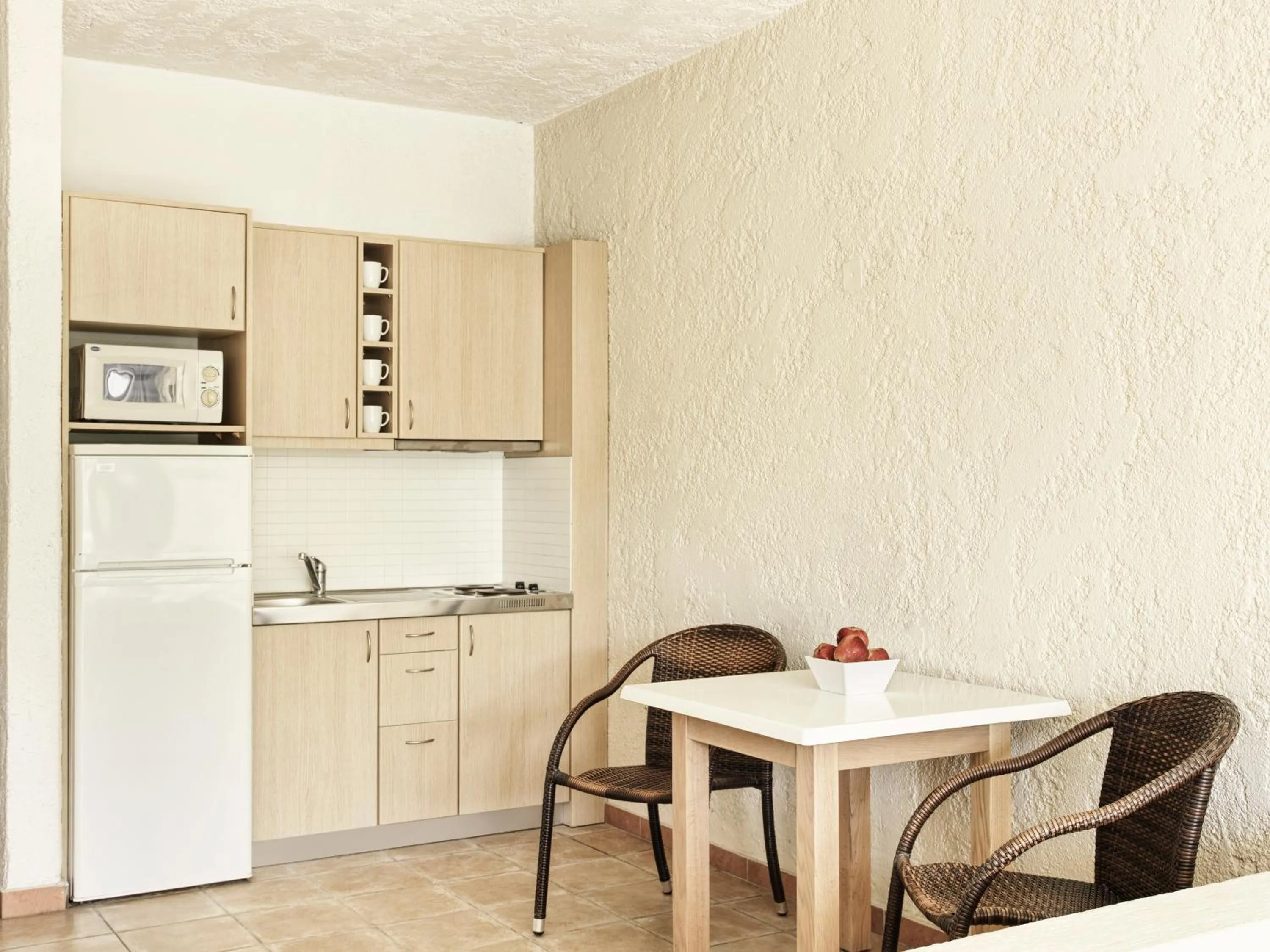 kitchen in The Apartments by Esperia