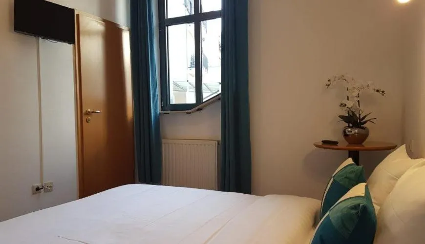 Bed in Hôtel La Charbonnade