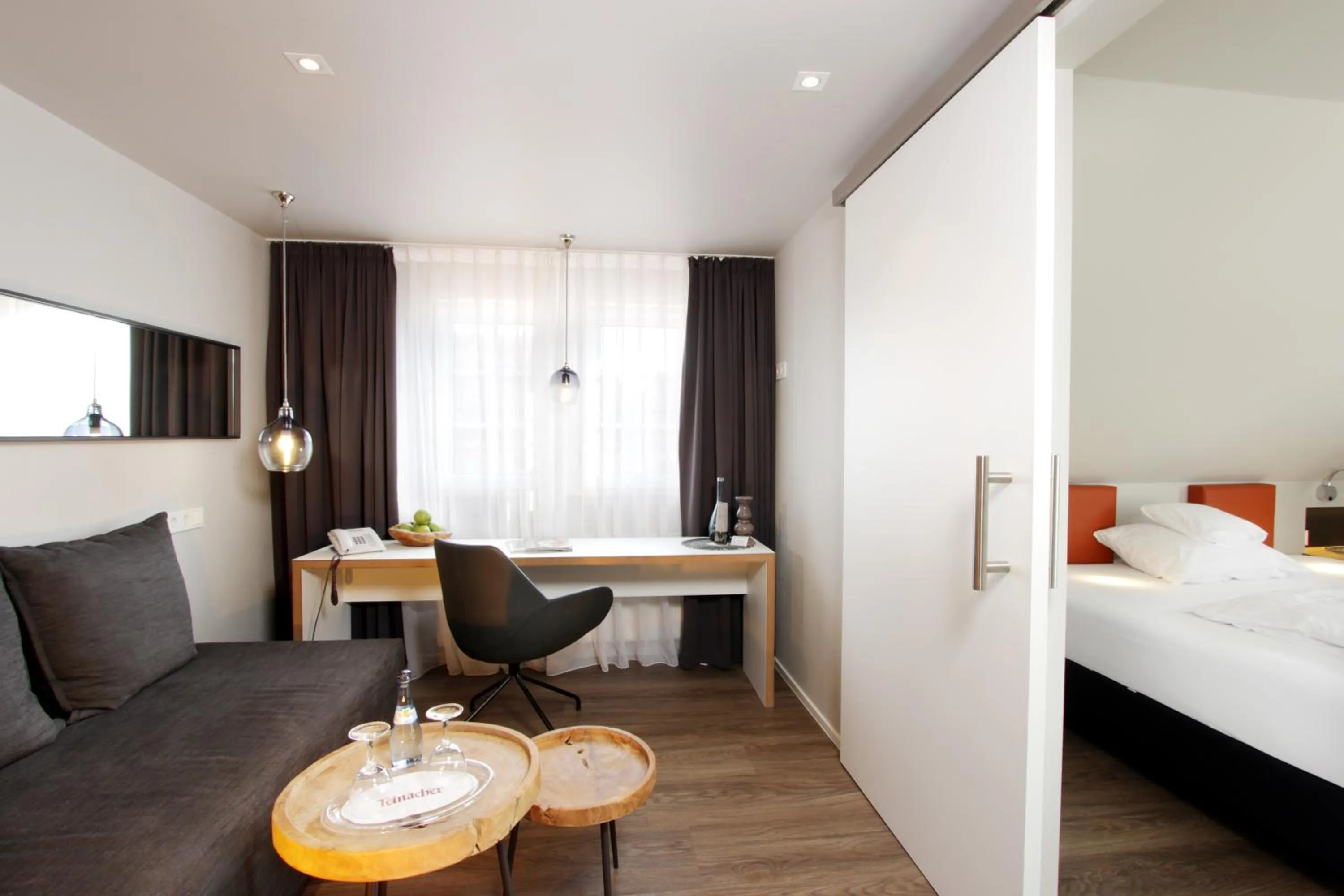 Seating area, Bed in REINHARDTs HOTEL