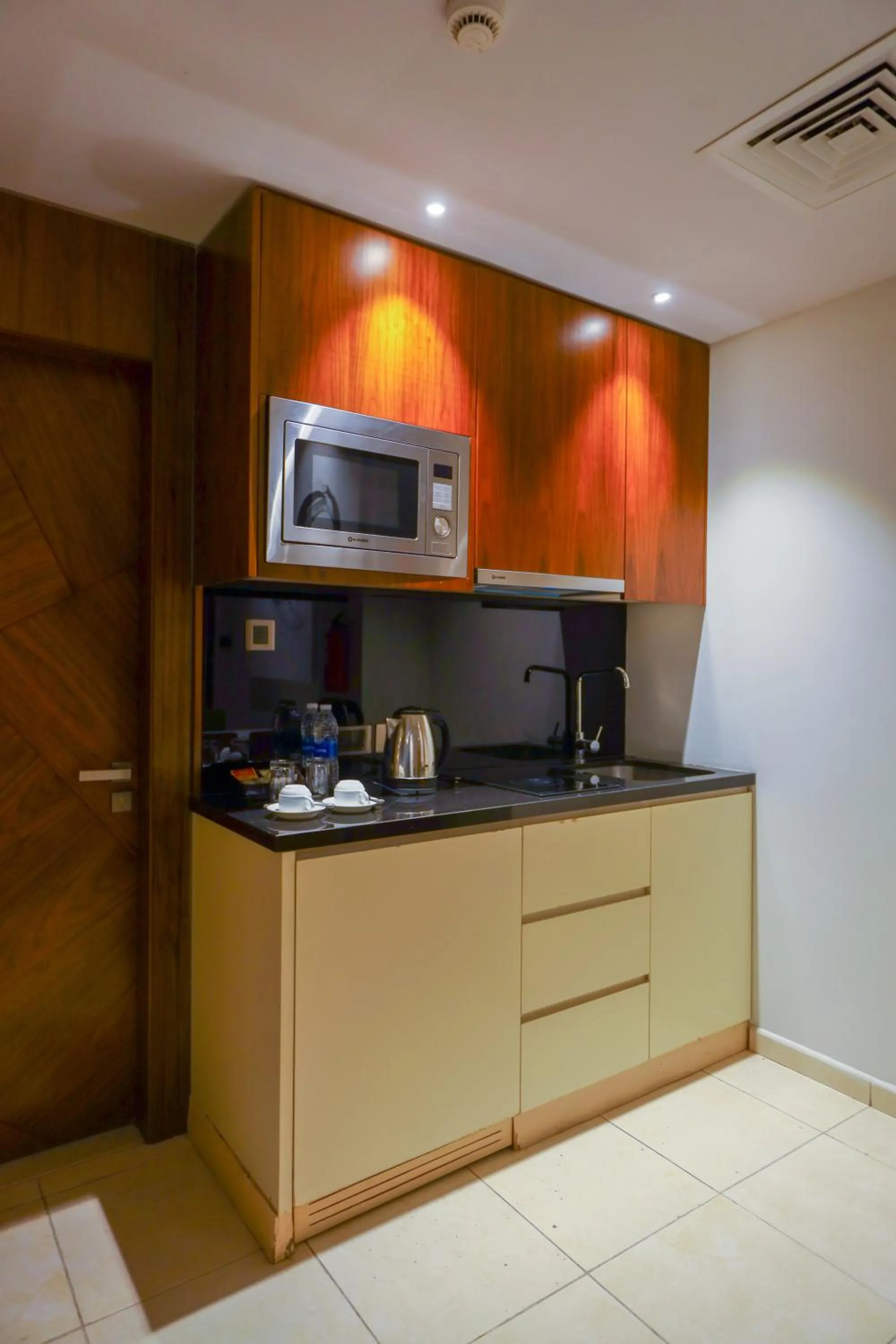 Kitchen or kitchenette in Ramee Palace Hotel