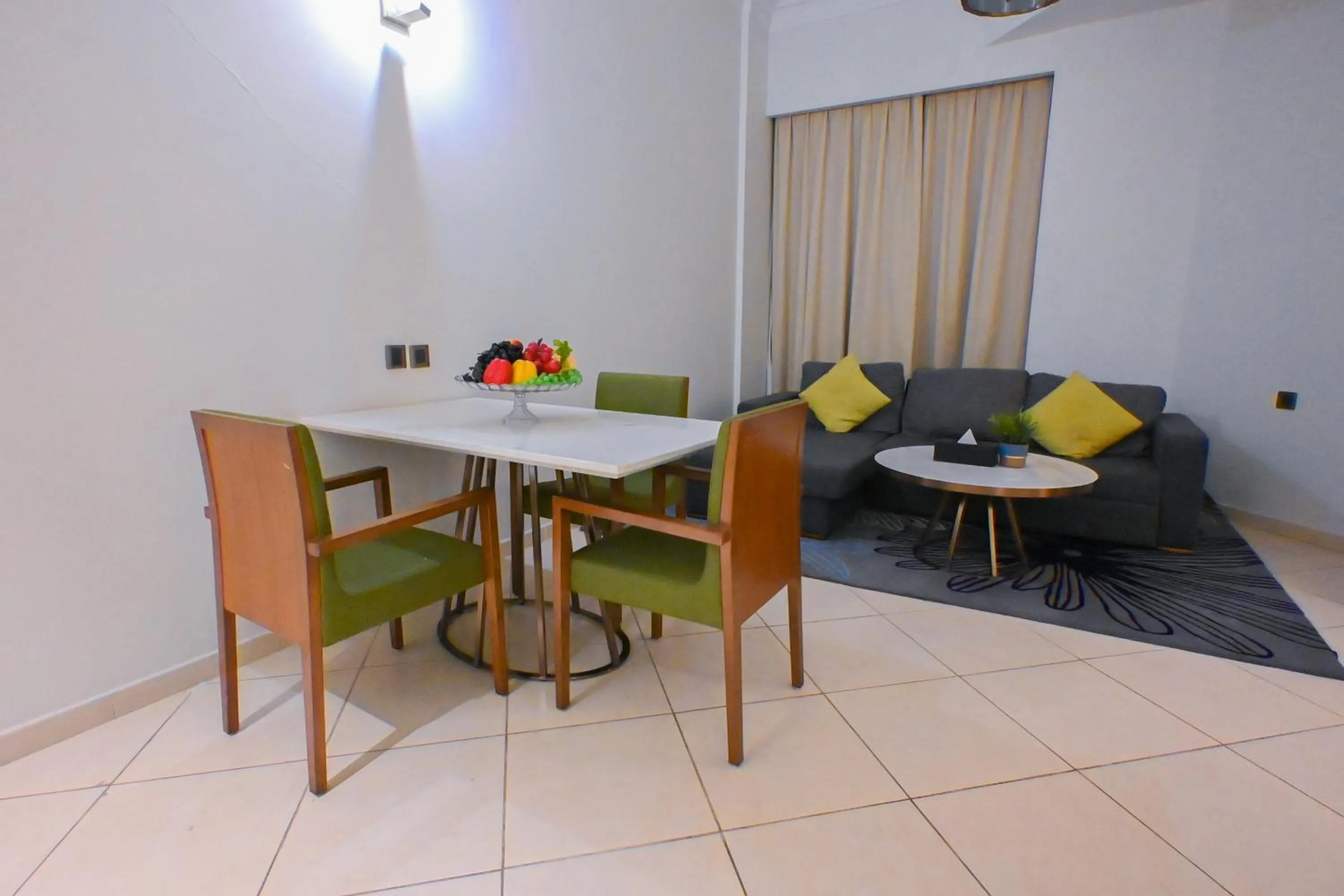 Living room in Ramee Palace Hotel