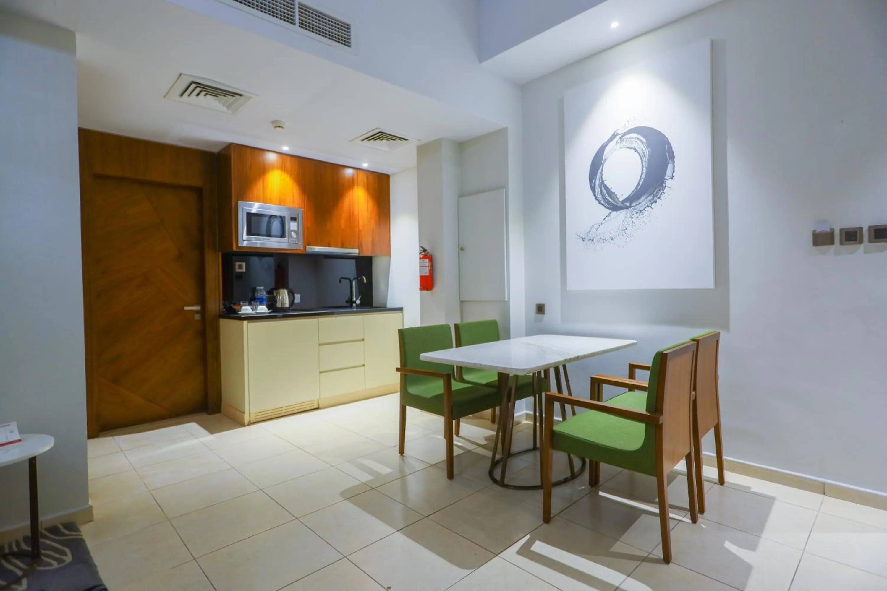 Kitchen or kitchenette in Ramee Palace Hotel
