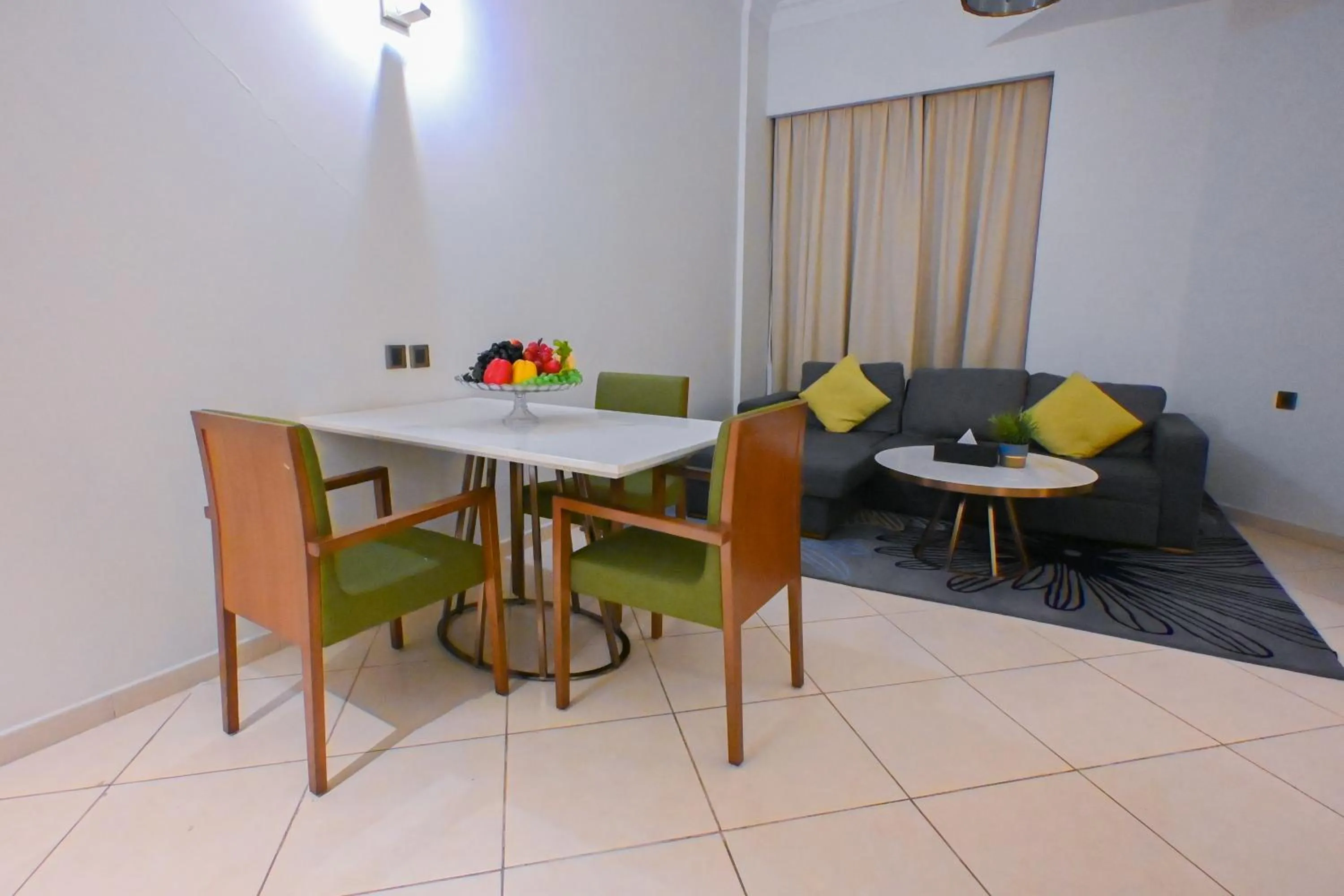 Seating area in Ramee Palace Hotel