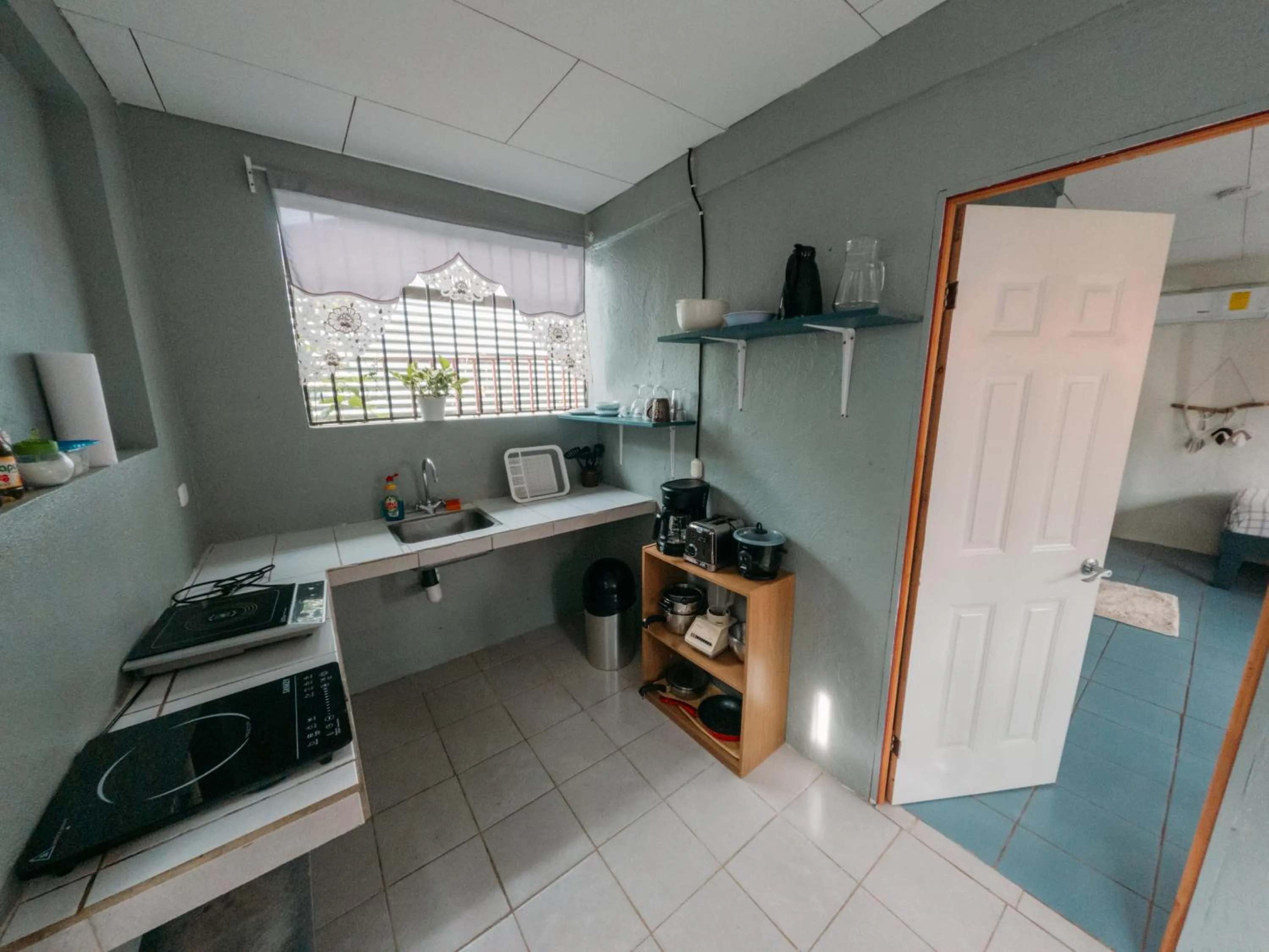 kitchen in Rooms & Pool Macaws