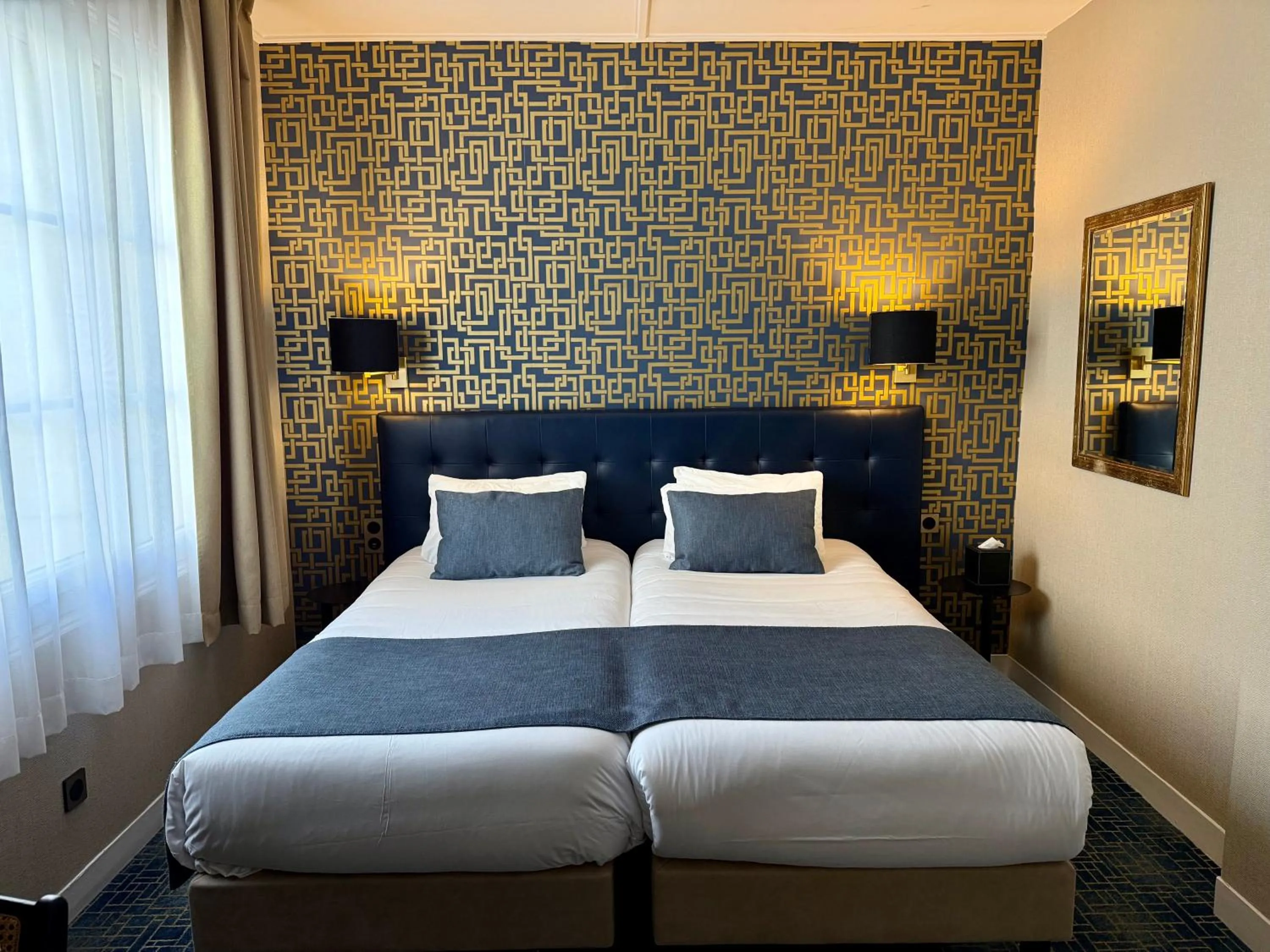 Bed in Churchill Hotel Bayeux Centre