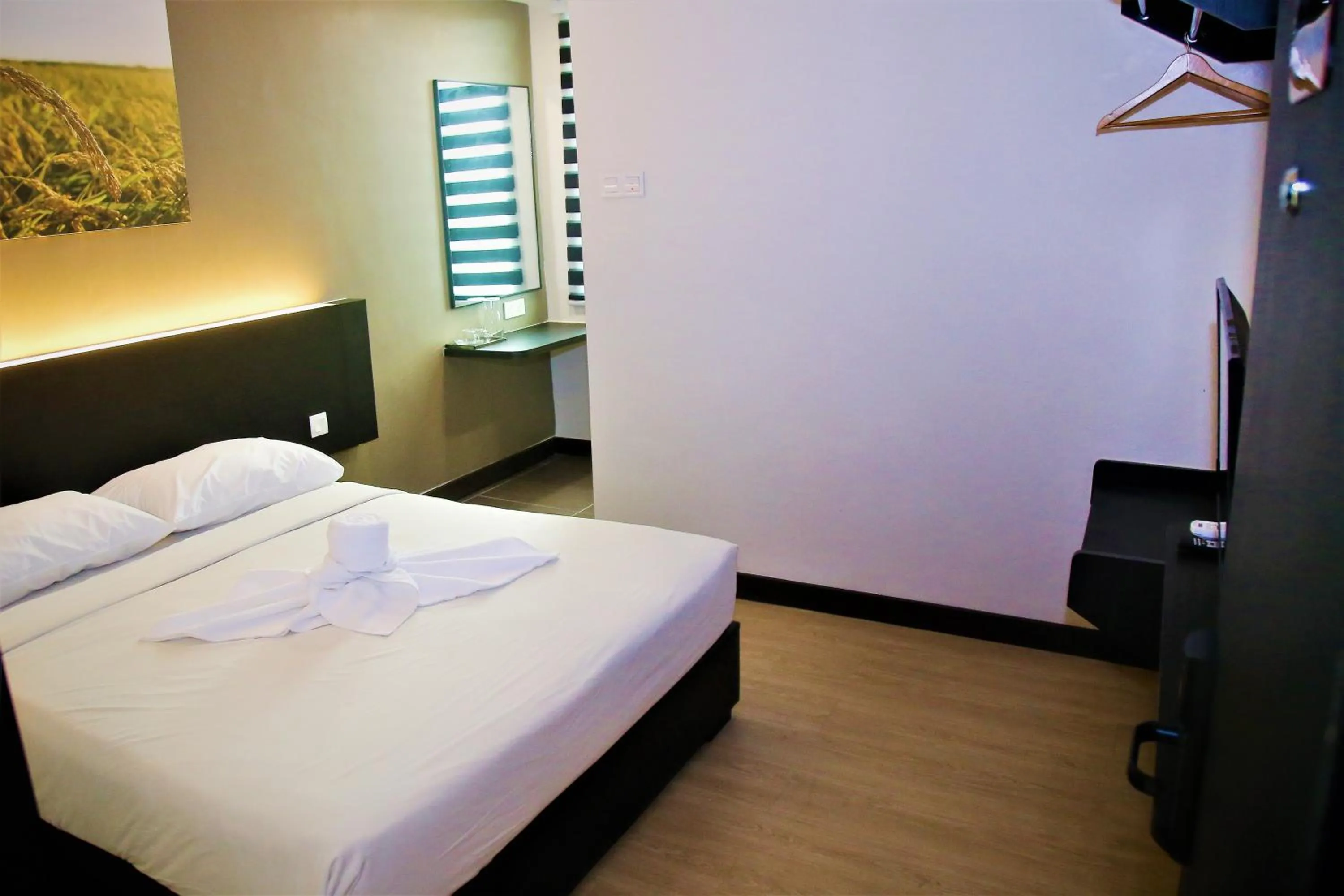 Bed in PADI PADI HOTEL