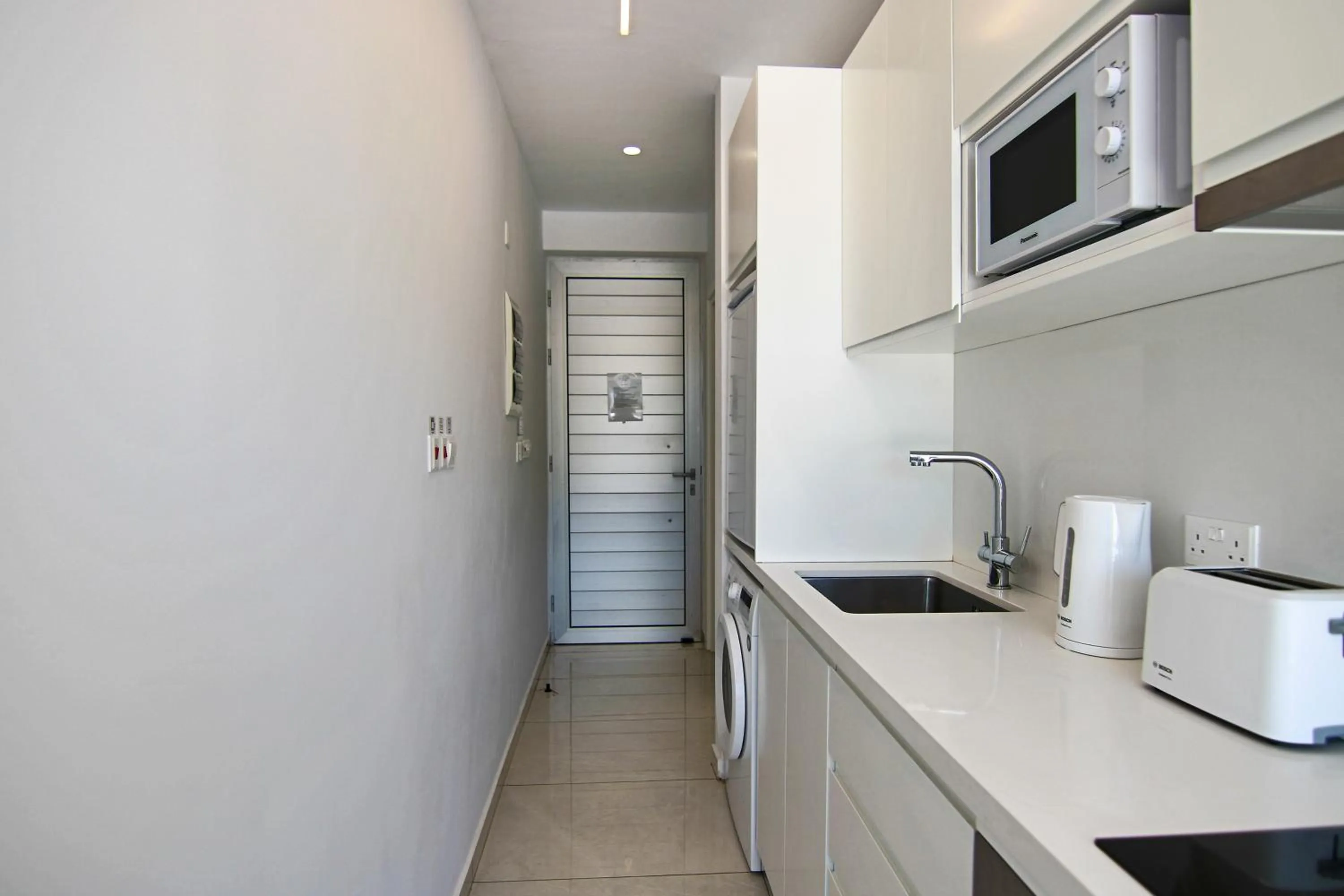 Kitchen or kitchenette in Phaedrus Living - Seaside Luxury Flat Harbour 108
