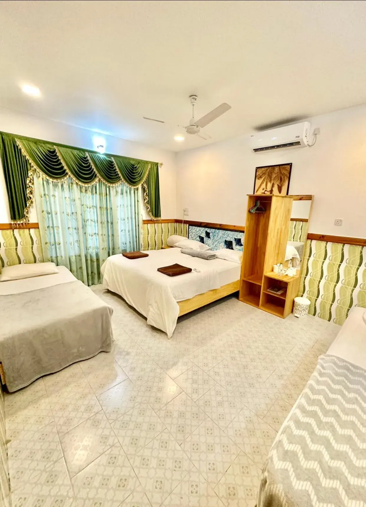 Quadruple Room with Garden View in Summer Vibes Beach Front Quadruple Room with Garden View in Summer Vibes Beach Front