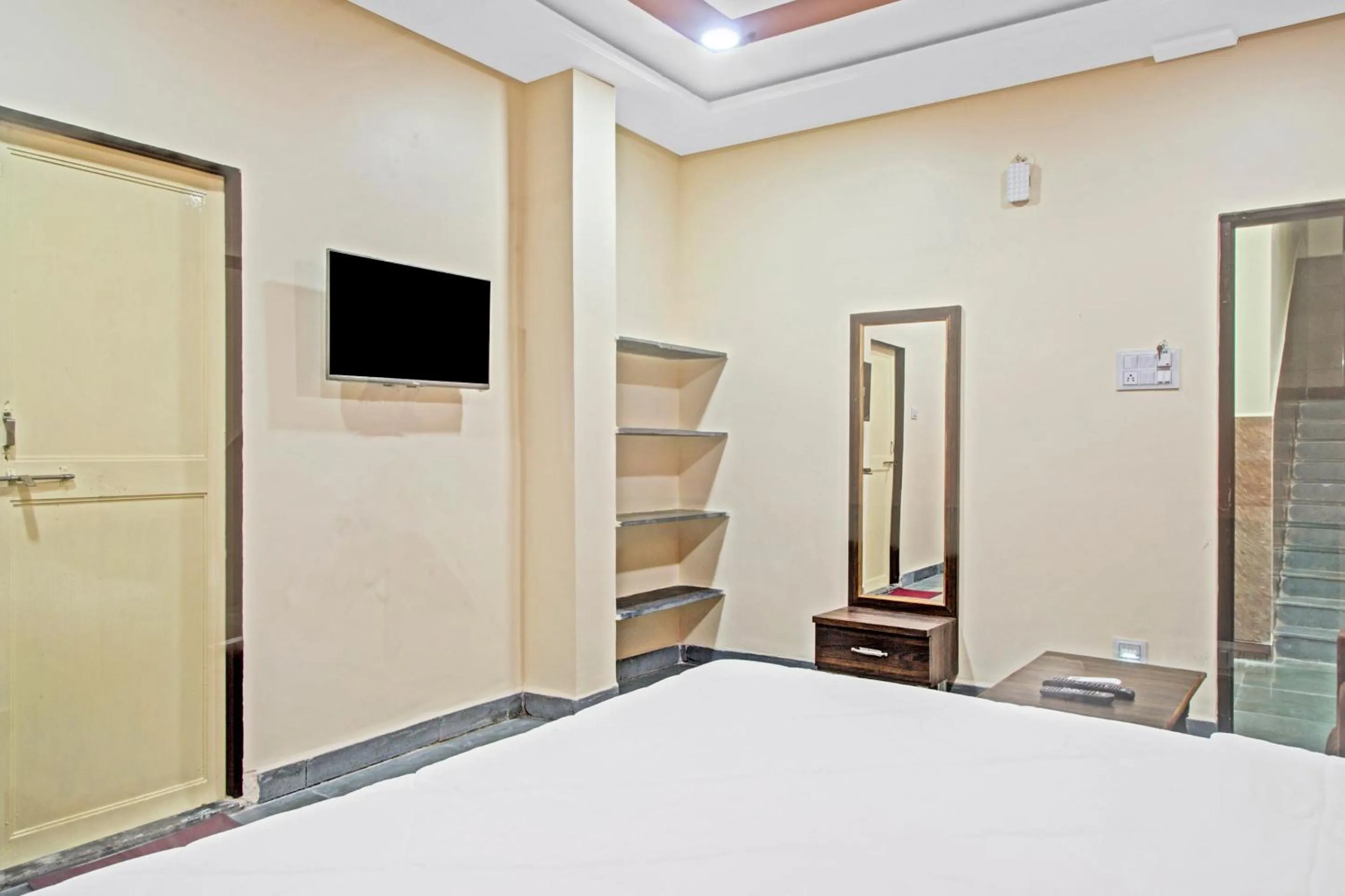 Bedroom in Hotel O Patil