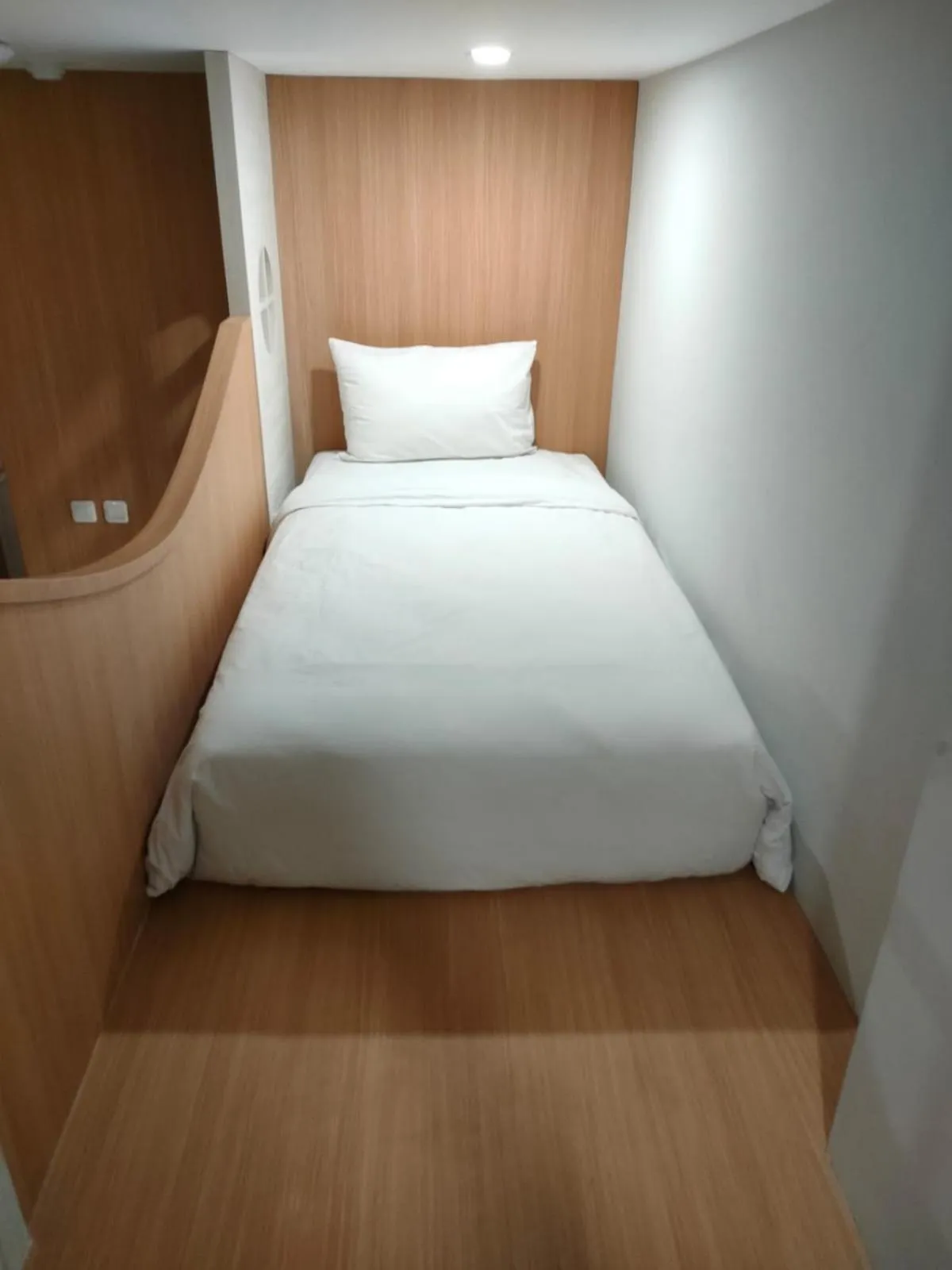 Bed in The West Cove Hotel