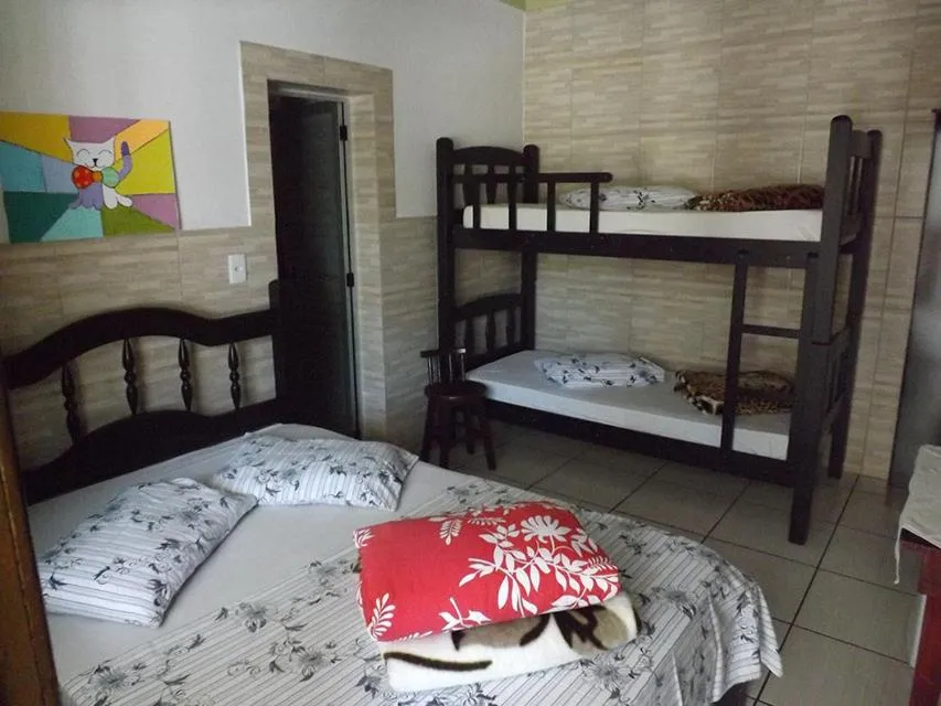 Bed in Pousada Anjo Gabriel