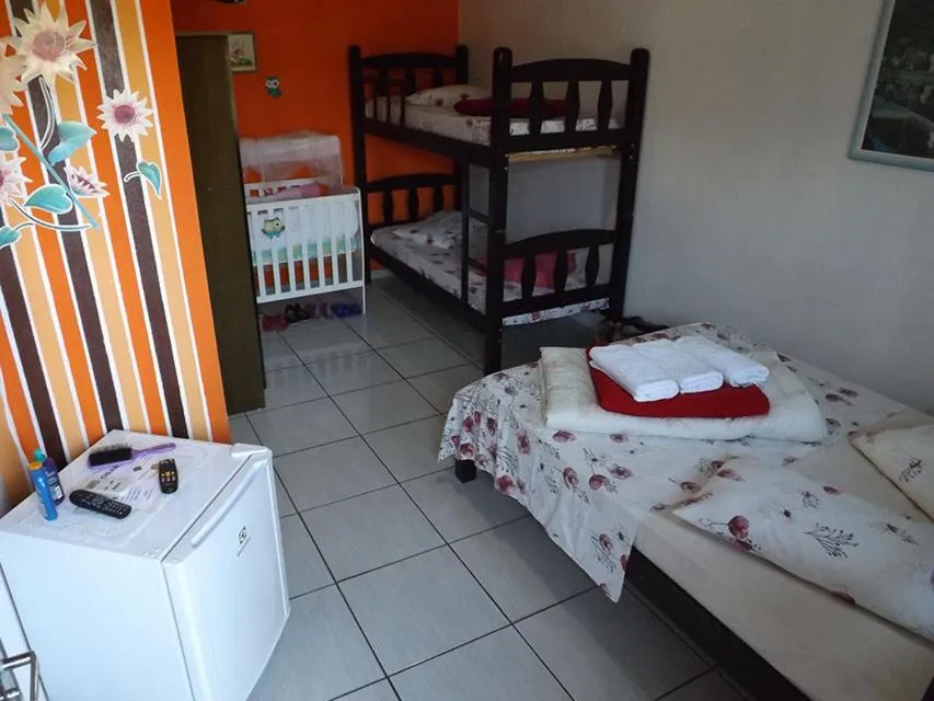 Bed in Pousada Anjo Gabriel