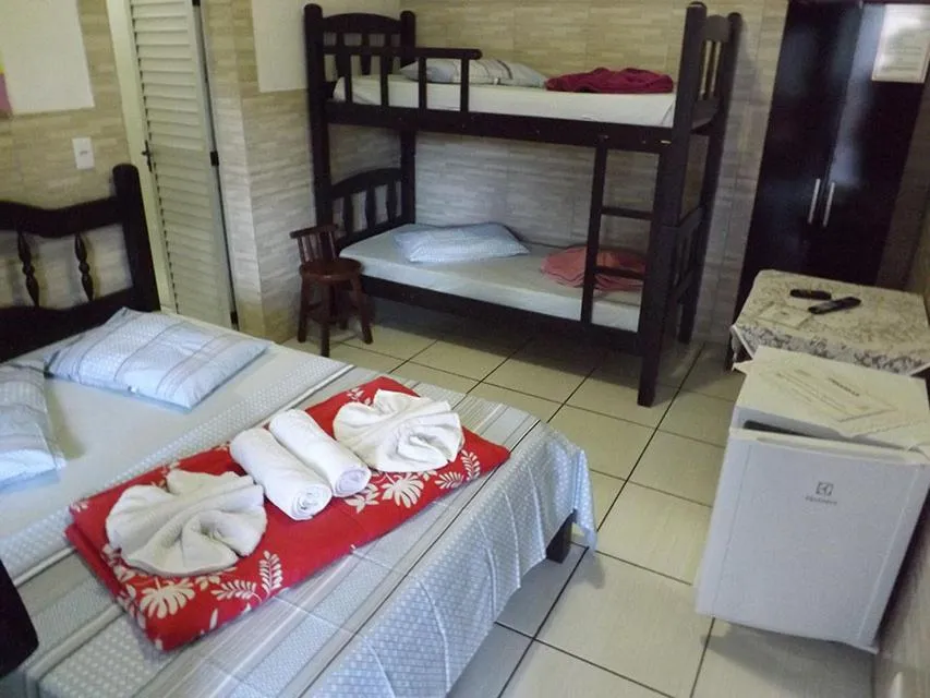 Bed in Pousada Anjo Gabriel