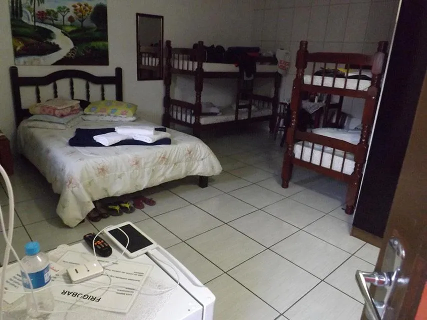 Bed in Pousada Anjo Gabriel