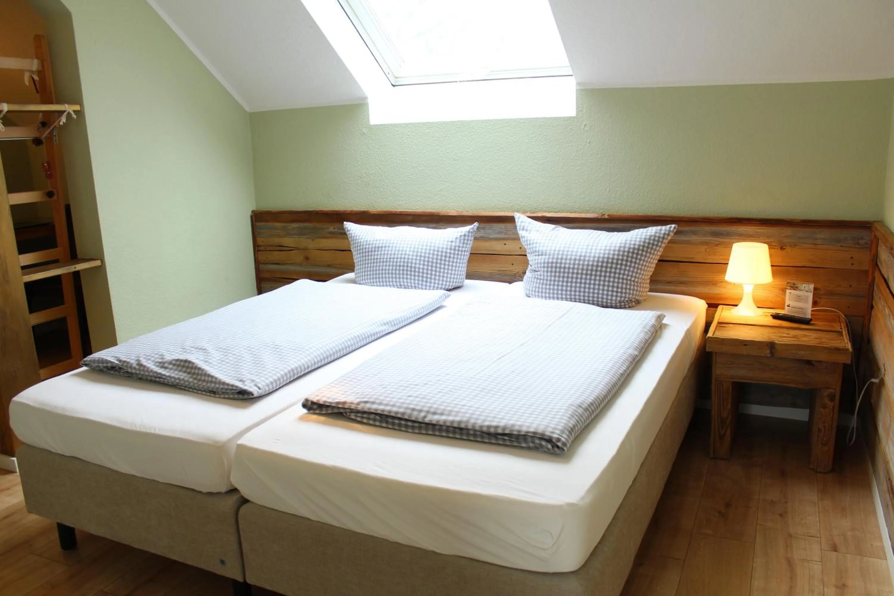 Photo of the whole room, Bed in ARRIVEL Pension Haus am Bach