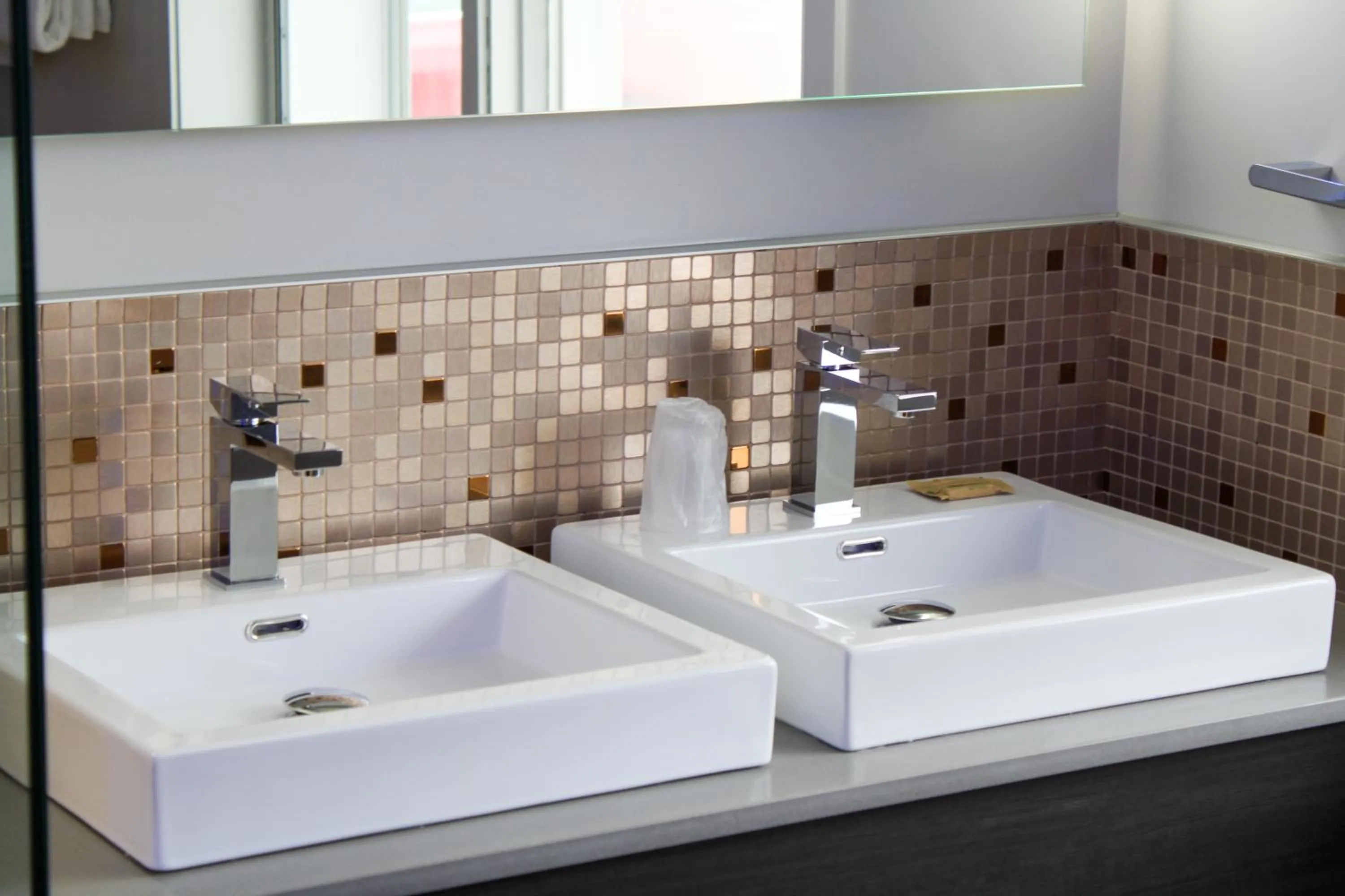 Bathroom in Olux Hotel-Motel-Suites